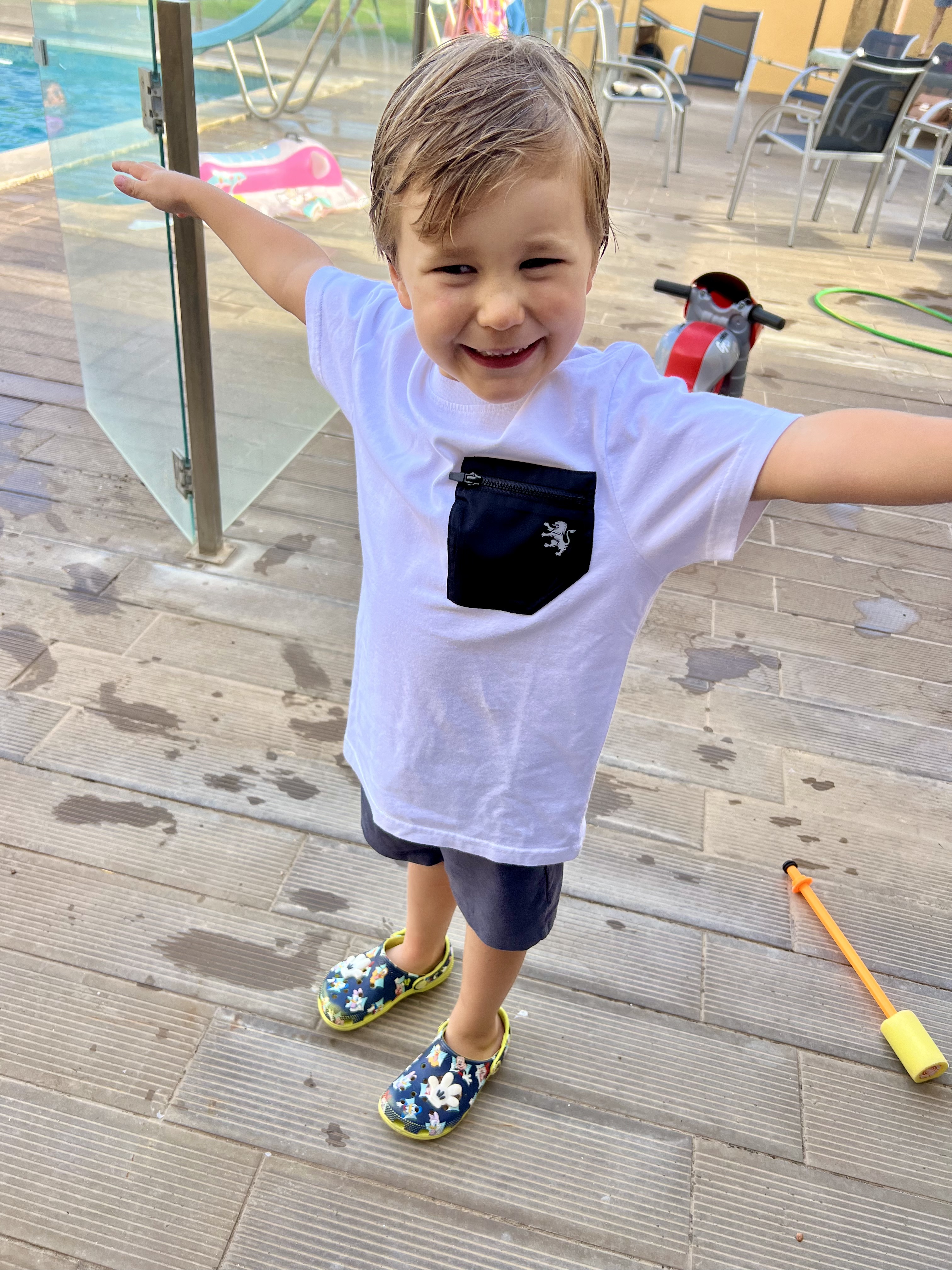 Img: shoe, photography, person, portrait, shorts, t-shirt, sneaker, sandal, boy, child