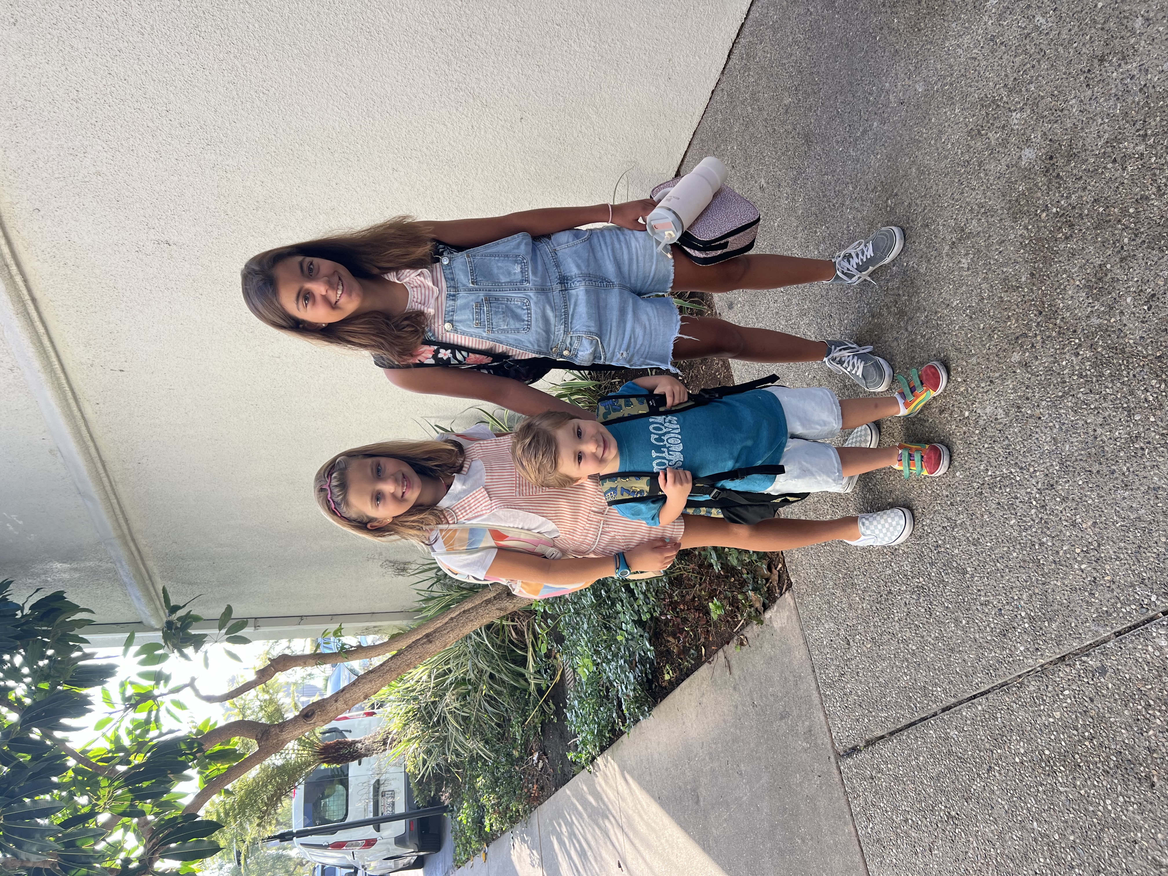 Img: pants, shorts, city, street, path, female, girl, person, teen, jeans