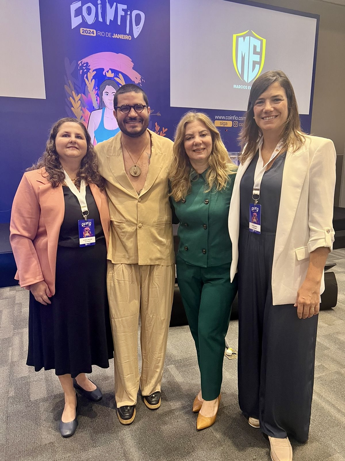 741a97e7 22ce 451a Aec8 53f4b4bed945: clothing, coat, blazer, jacket, groupshot, person, pants, pajamas