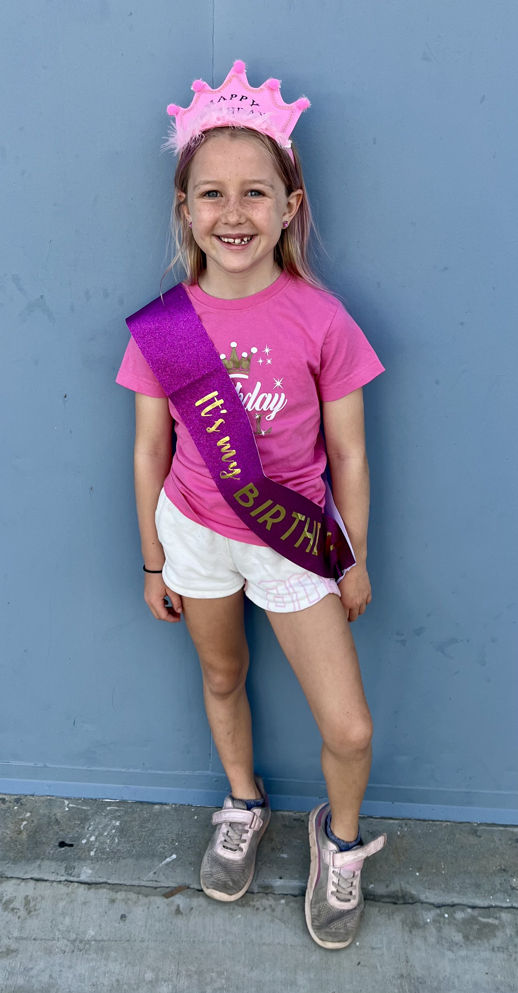 Img: child, female, girl, person, clothing, footwear, shoe, shorts, accessories, portrait