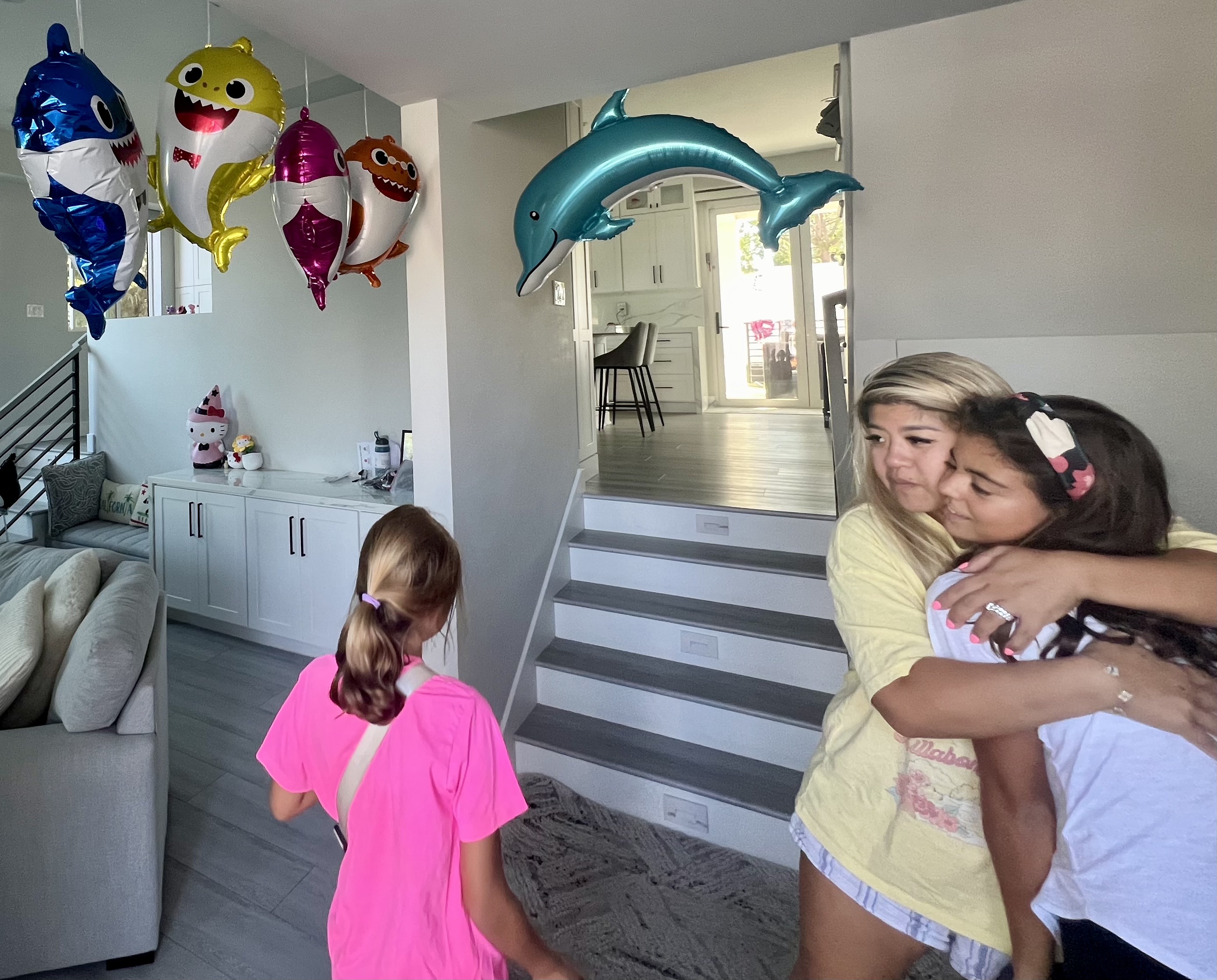 Img: people, person, floor, child, female, girl, portrait, living room, staircase, balloon