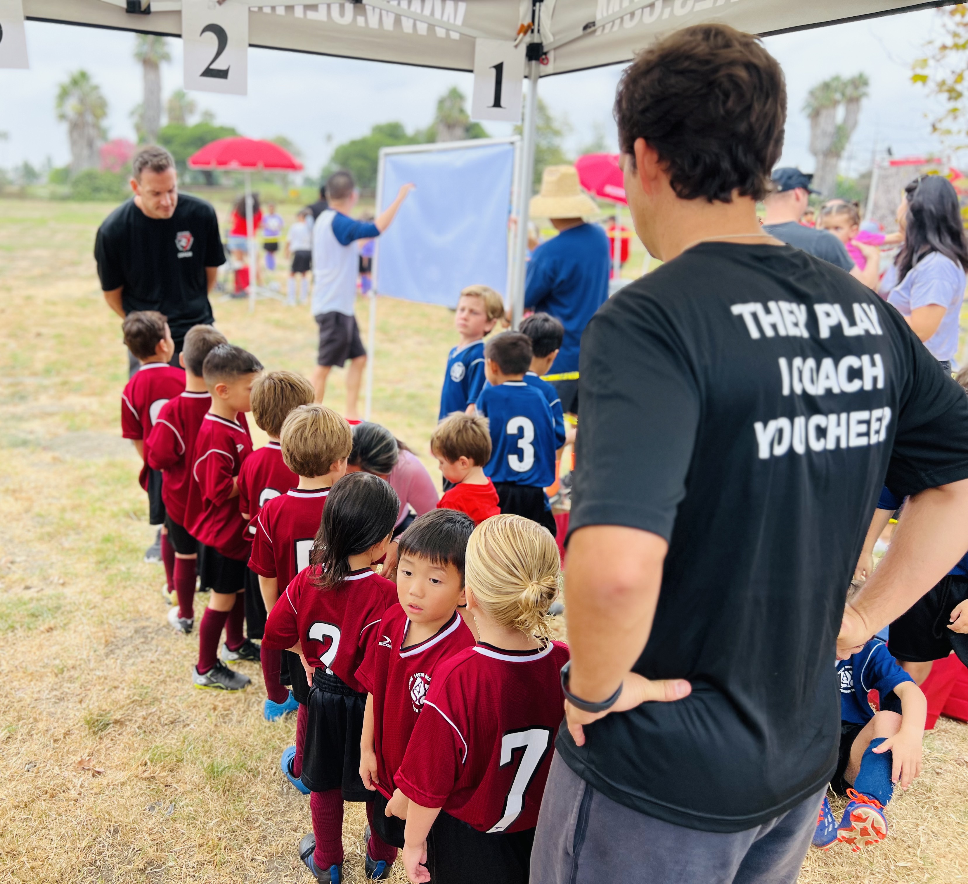 Img: people, person, t-shirt, hat, adult, male, man, shoe, boy, child