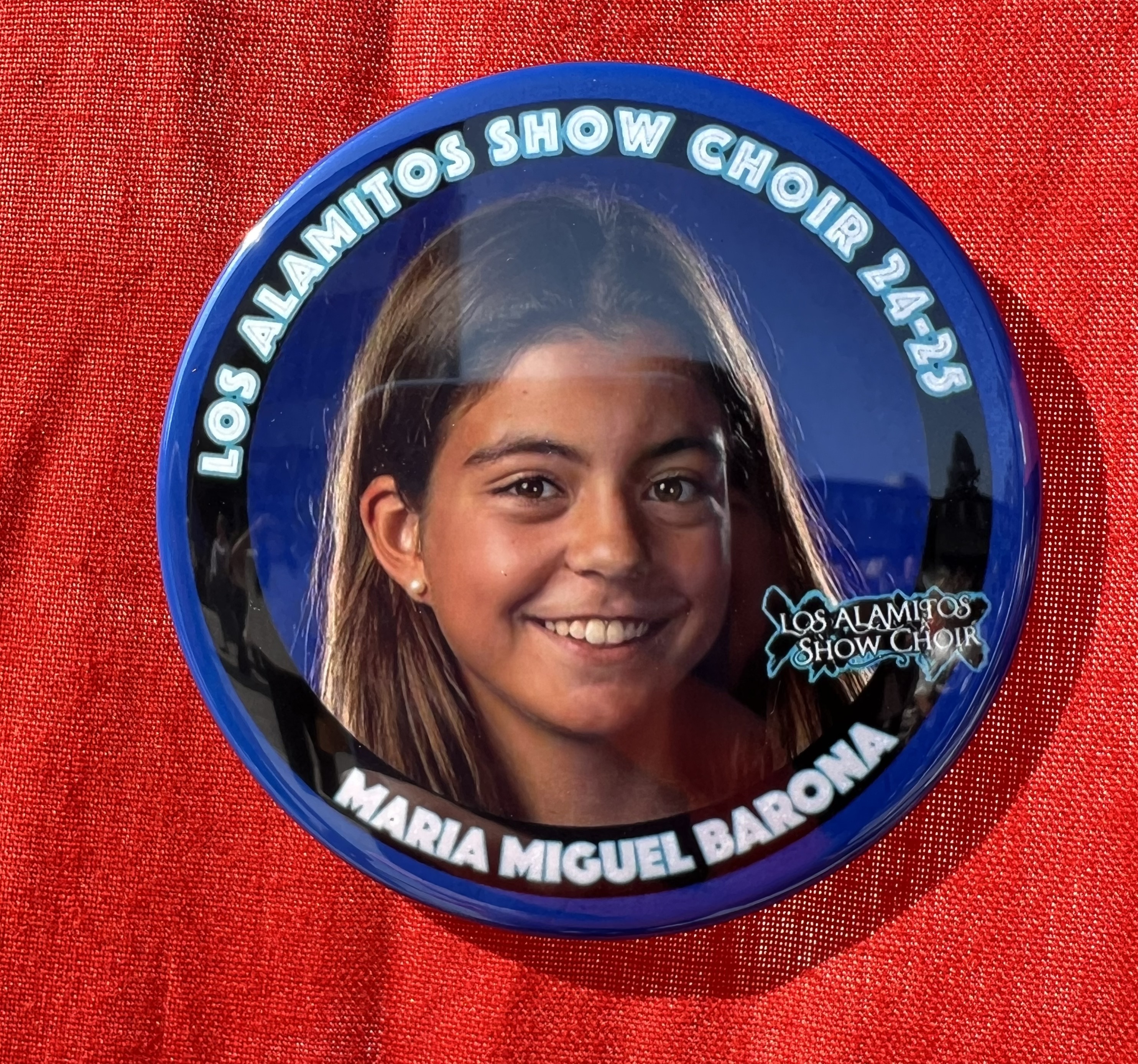 Img: badge, logo, symbol, adult, female, person, woman, head, face, portrait