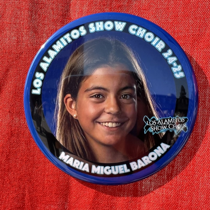 Img: badge, logo, symbol, adult, female, person, woman, head, face, portrait