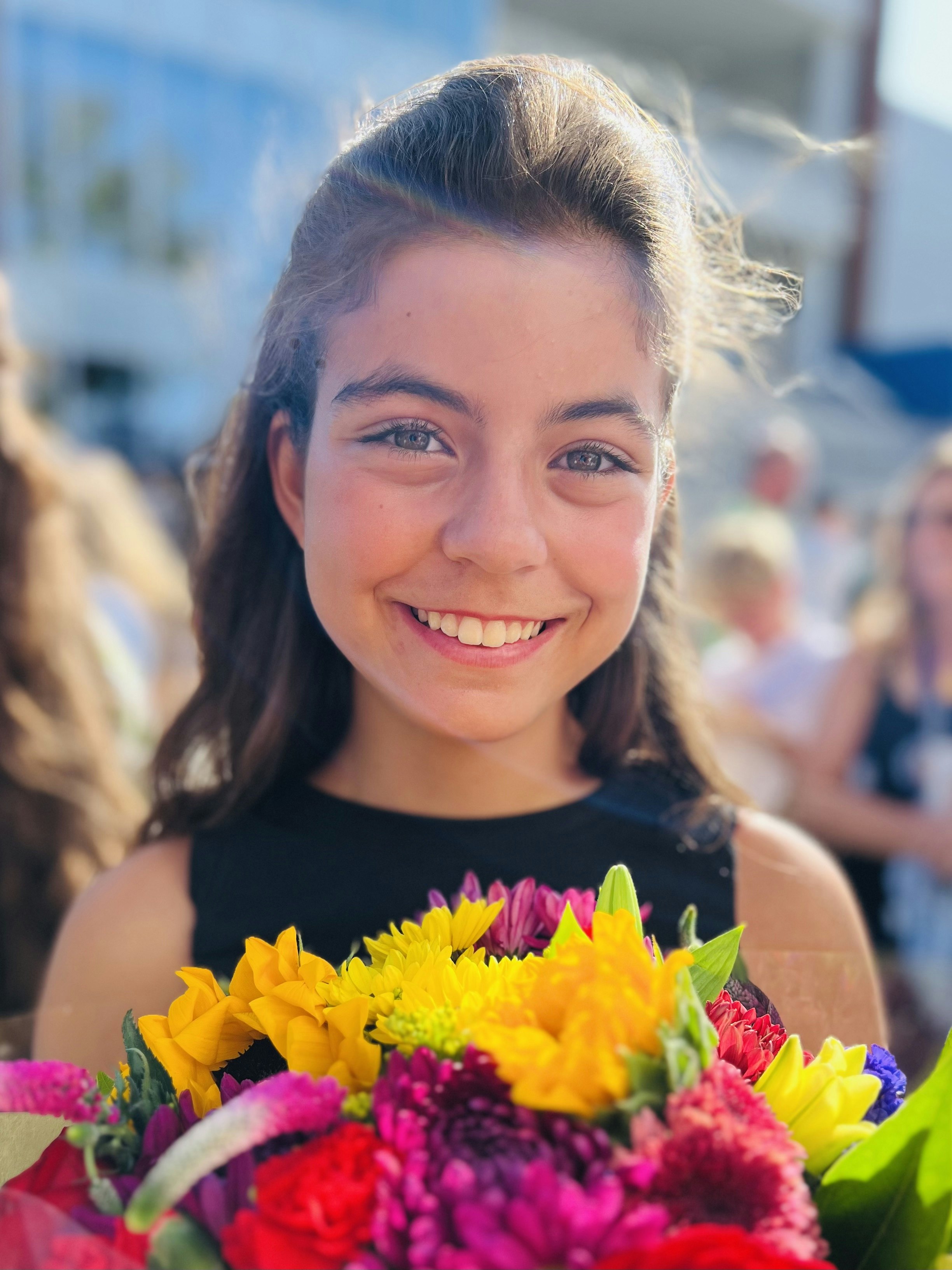Img: flower, flower arrangement, flower bouquet, plant, person, face, head, happy, smile