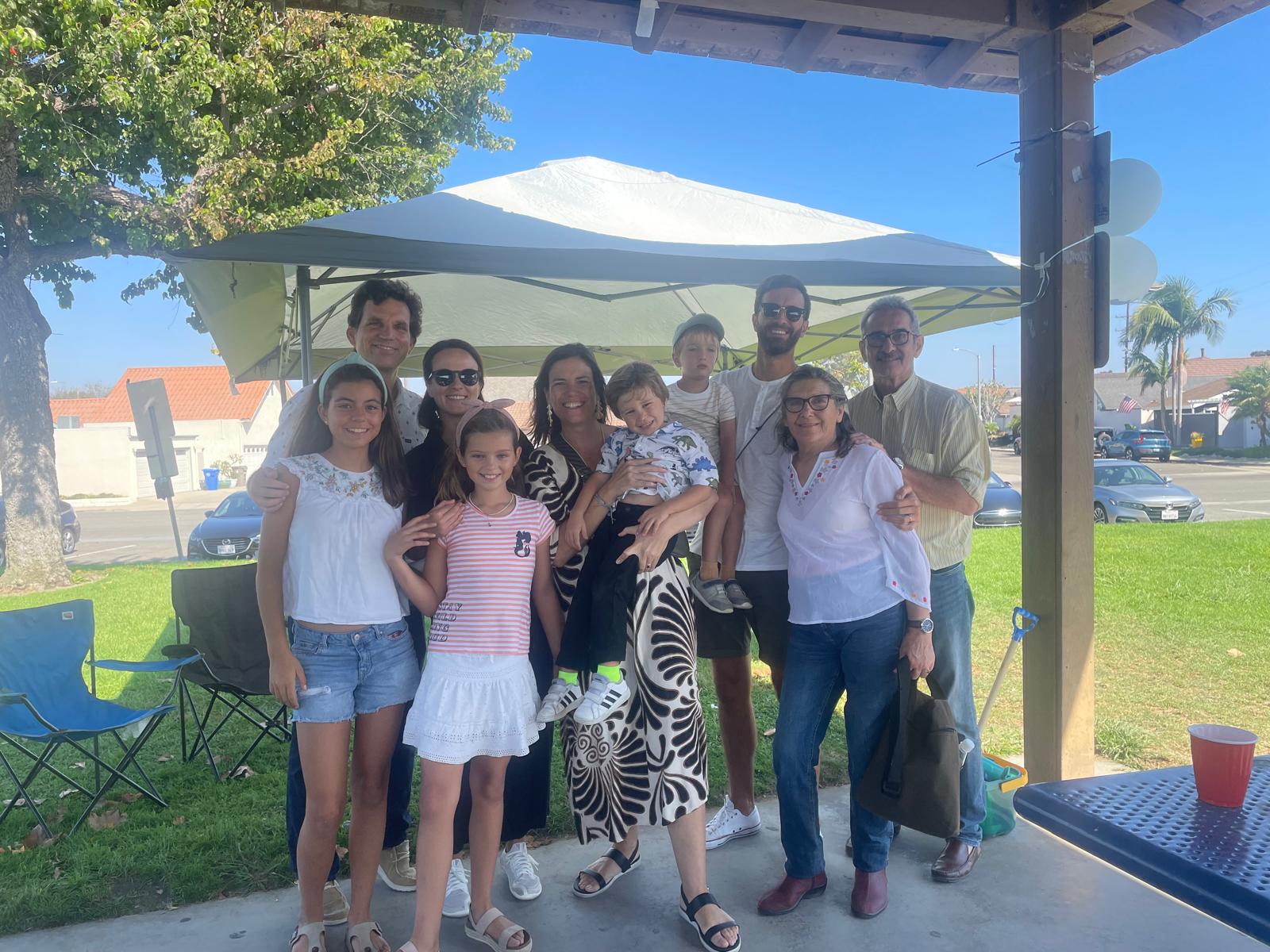 0e396371 4ad2 844d 932ee0b29c3a: shelter, person, portrait, people, pants, blouse, grass, skirt, summer, woman