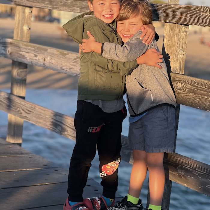 Img: waterfront, shoe, shorts, pier, pants, wood, boy, child, male, person