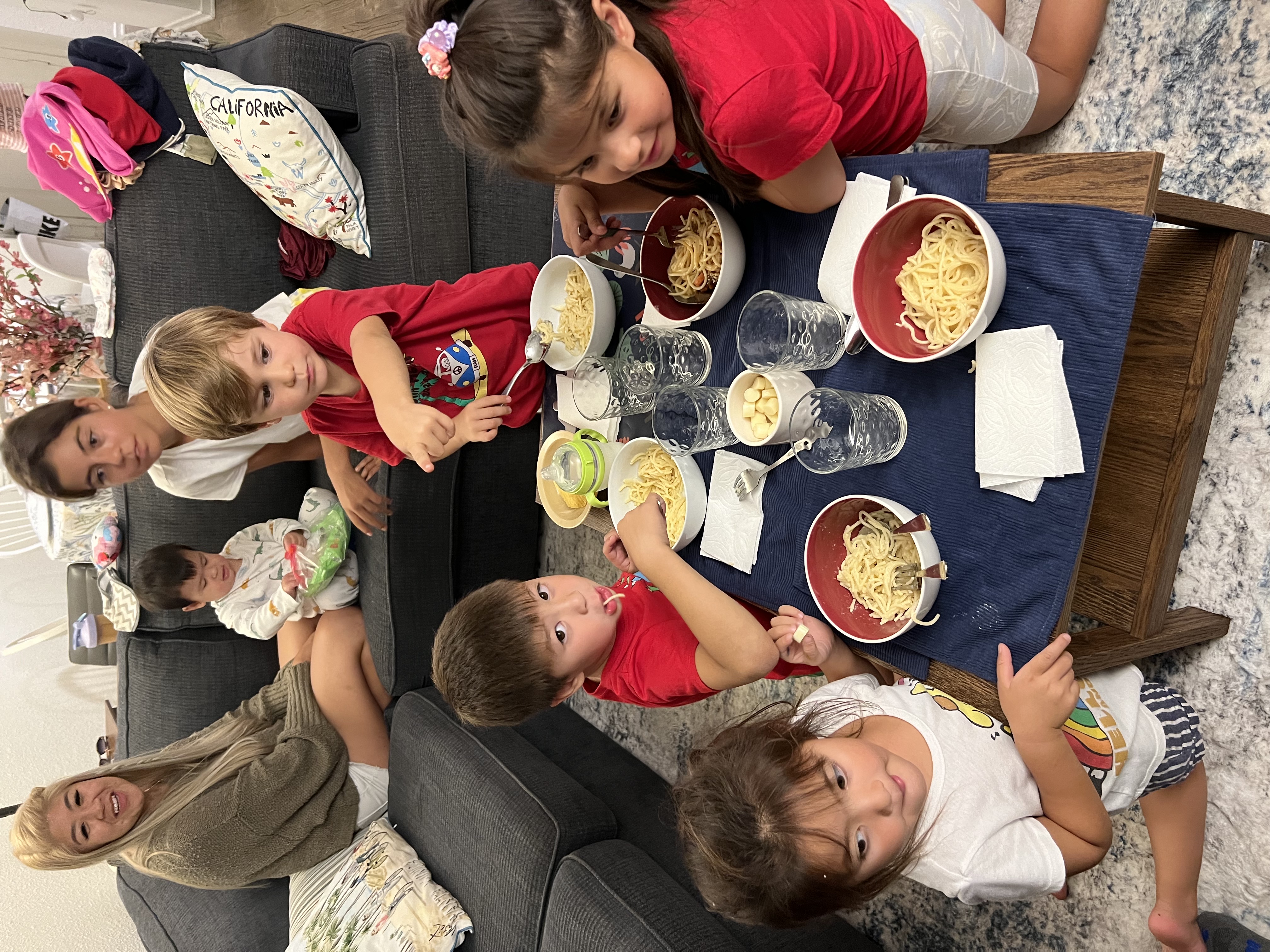 Img: couch, lunch, meal, adult, female, person, woman, child, girl, table