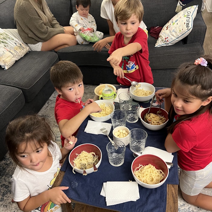 Img: couch, lunch, meal, adult, female, person, woman, child, girl, table