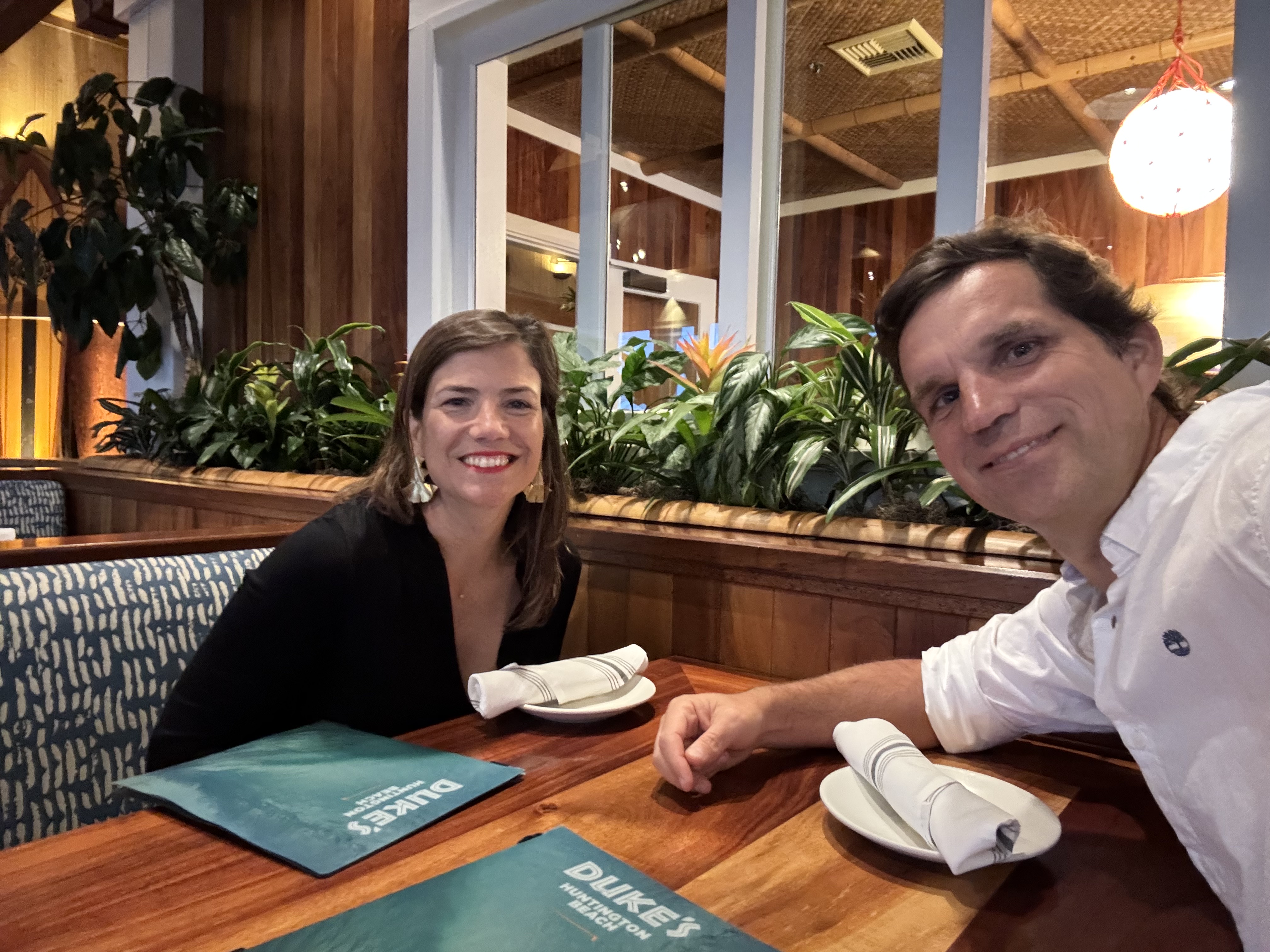 Img: potted plant, person, portrait, interior design, restaurant, wood, adult, female, woman, table