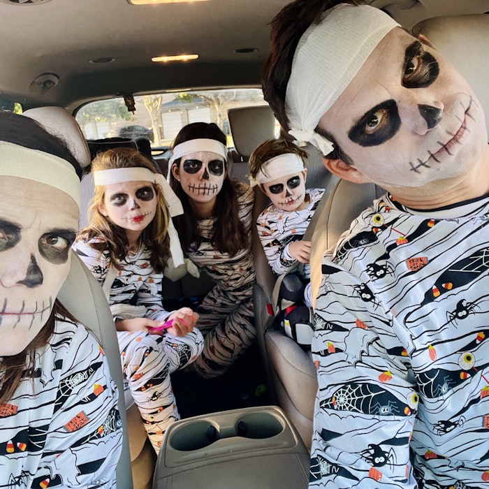 Img: adult, female, person, woman, car, transportation, vehicle, face, head, festival