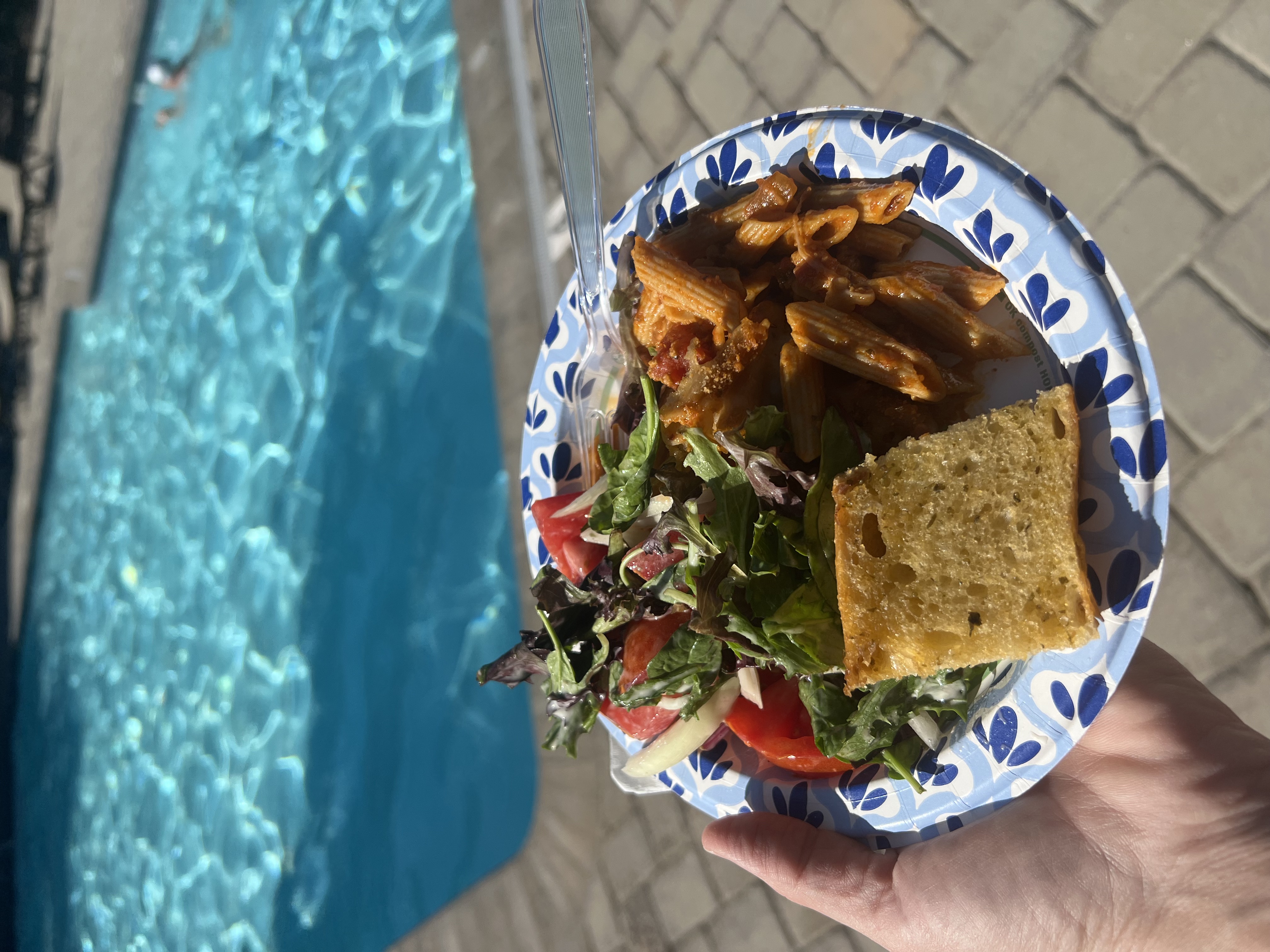 Img: food, food presentation, lunch, meal, brunch, plate, bread, swimming pool, water, person