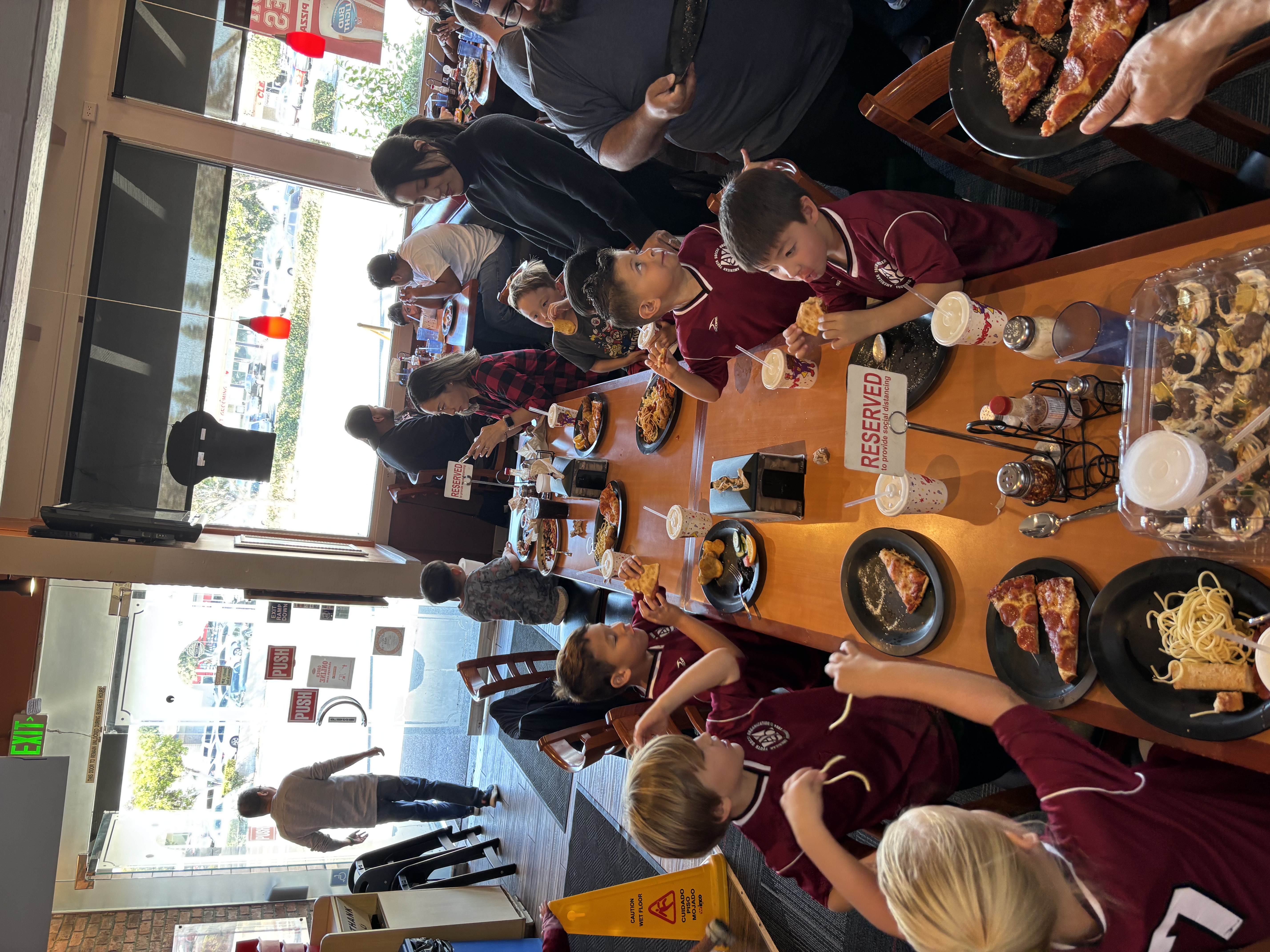 Img: indoors, restaurant, cafeteria, food court, adult, female, person, woman, cup, meal