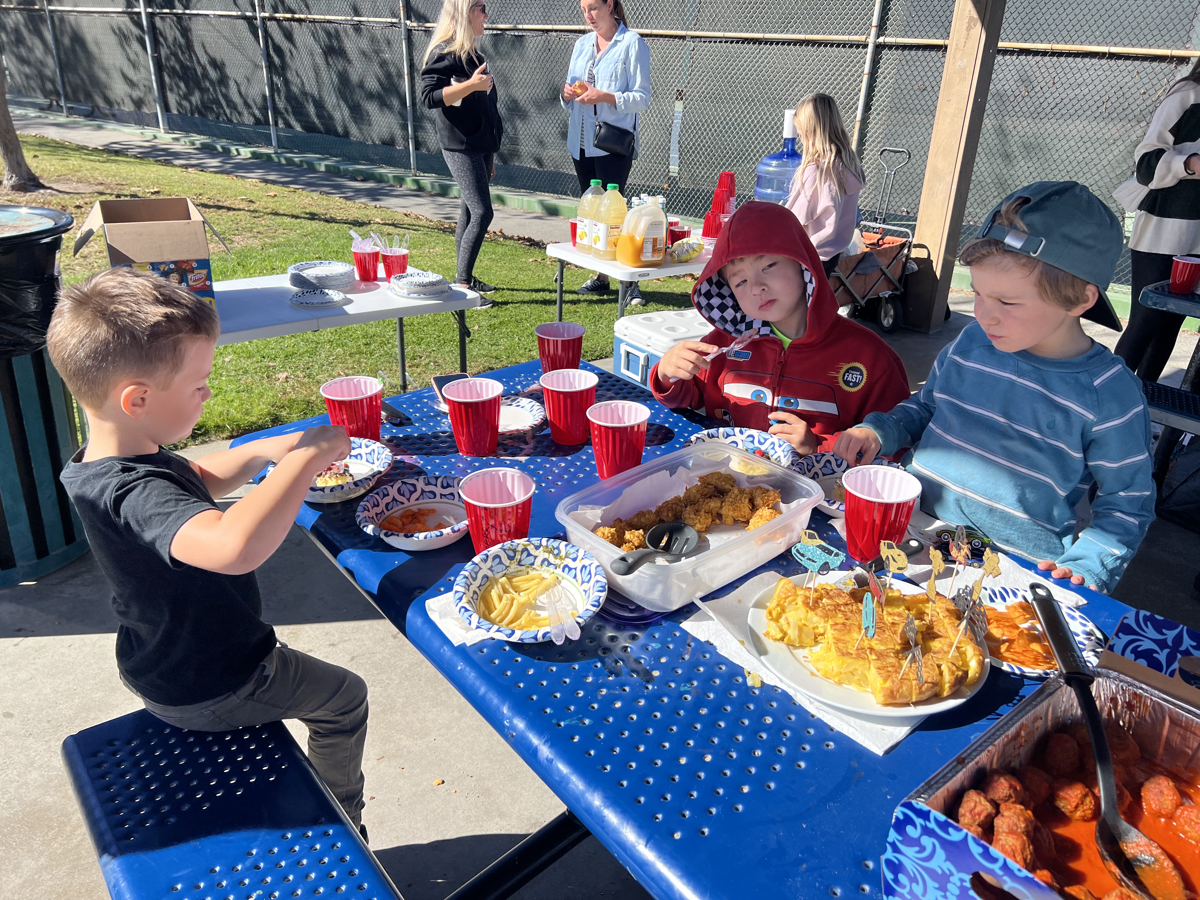 Img: lunch, boy, child, male, person, handbag, baby, cup, people, hat