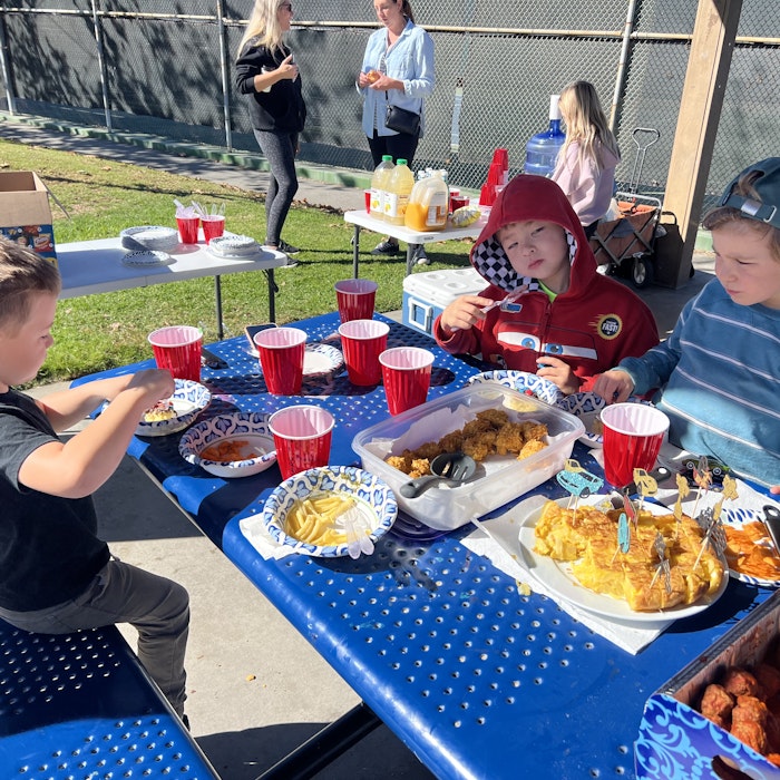 Img: lunch, boy, child, male, person, handbag, baby, cup, people, hat