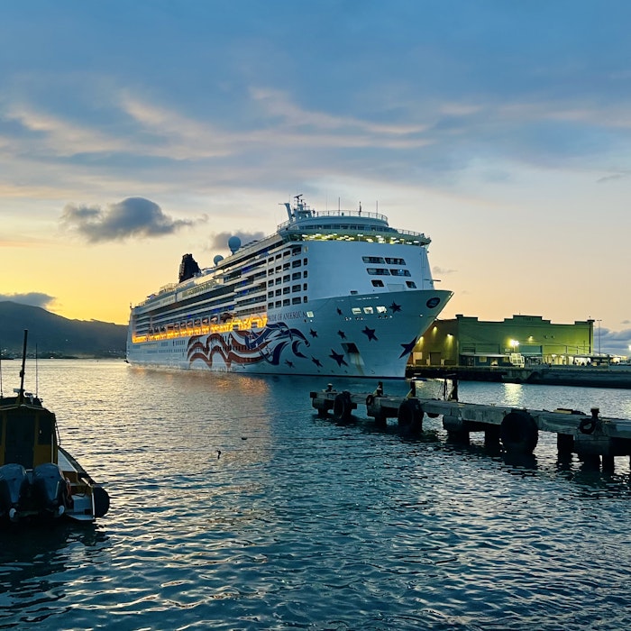 Img: water, waterfront, boat, transportation, vehicle, port, ship, cruise ship, person, pier