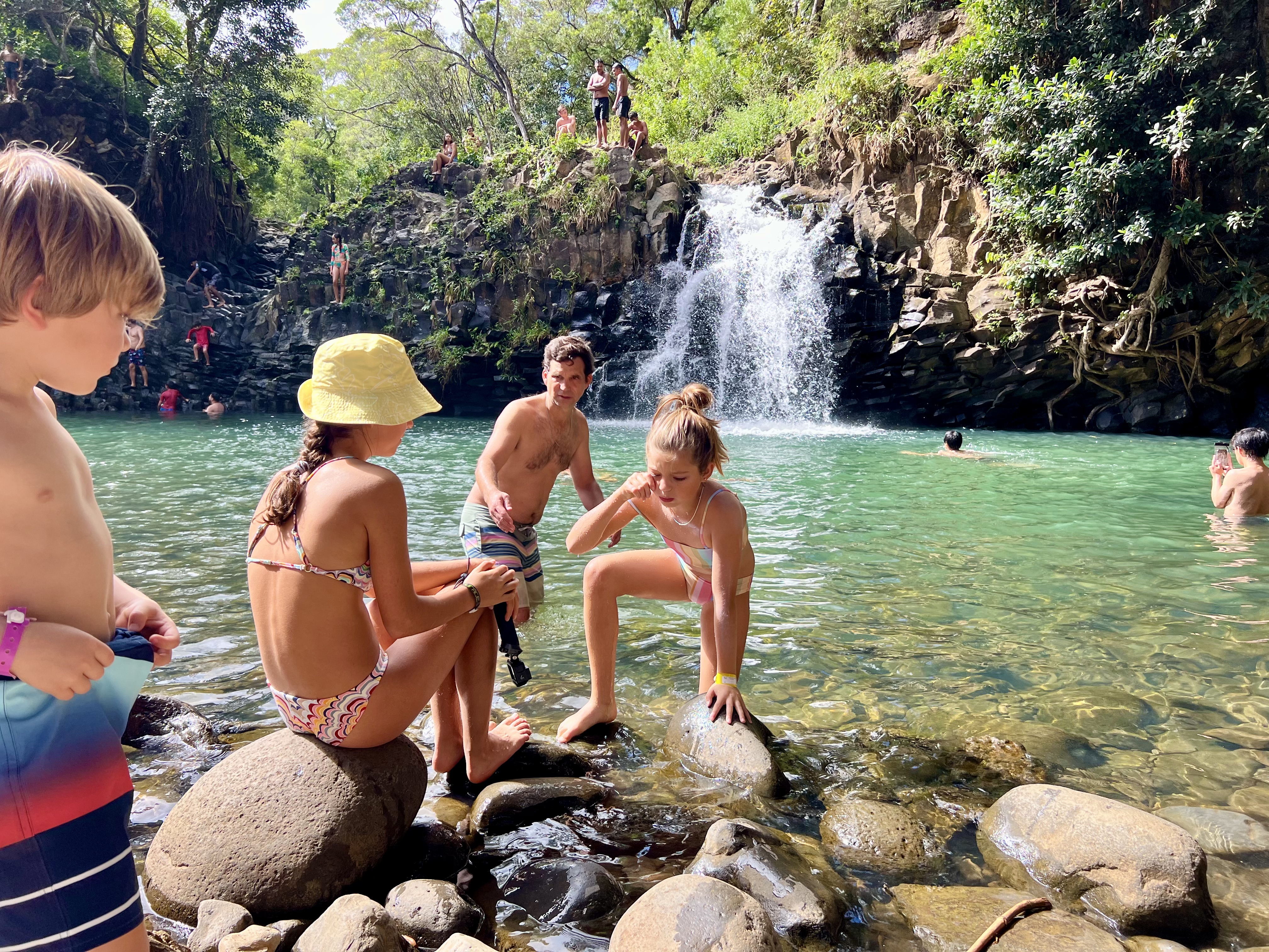 Img: swimwear, rock, summer, hat, back, person, adult, female, woman, child