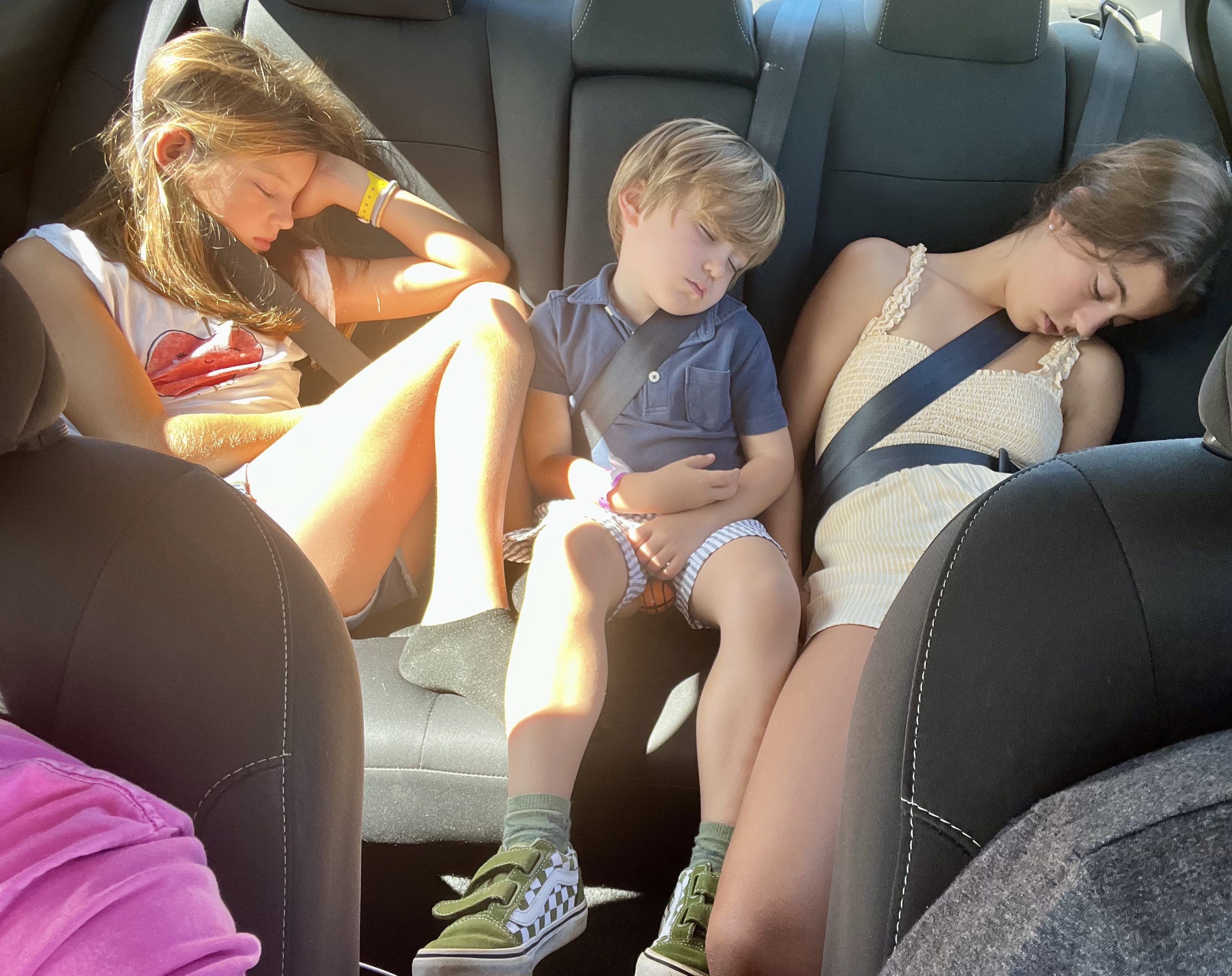 Img: adult, female, person, woman, shoe, boy, child, male, vehicle, car seat