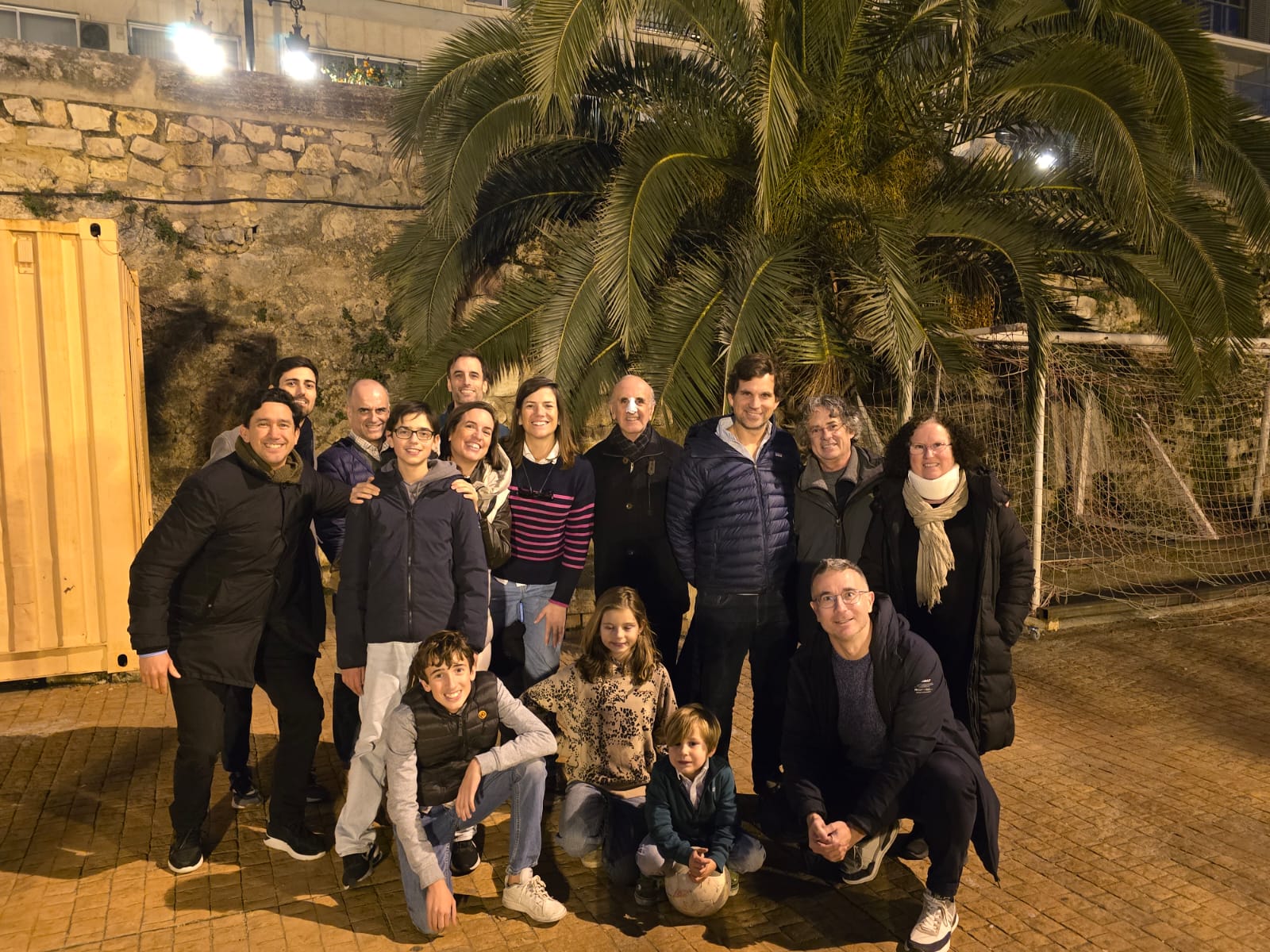 36d39cea 06bc 40063f38dace: people, person, groupshot, pants, adult, male, man, glasses, coat, child