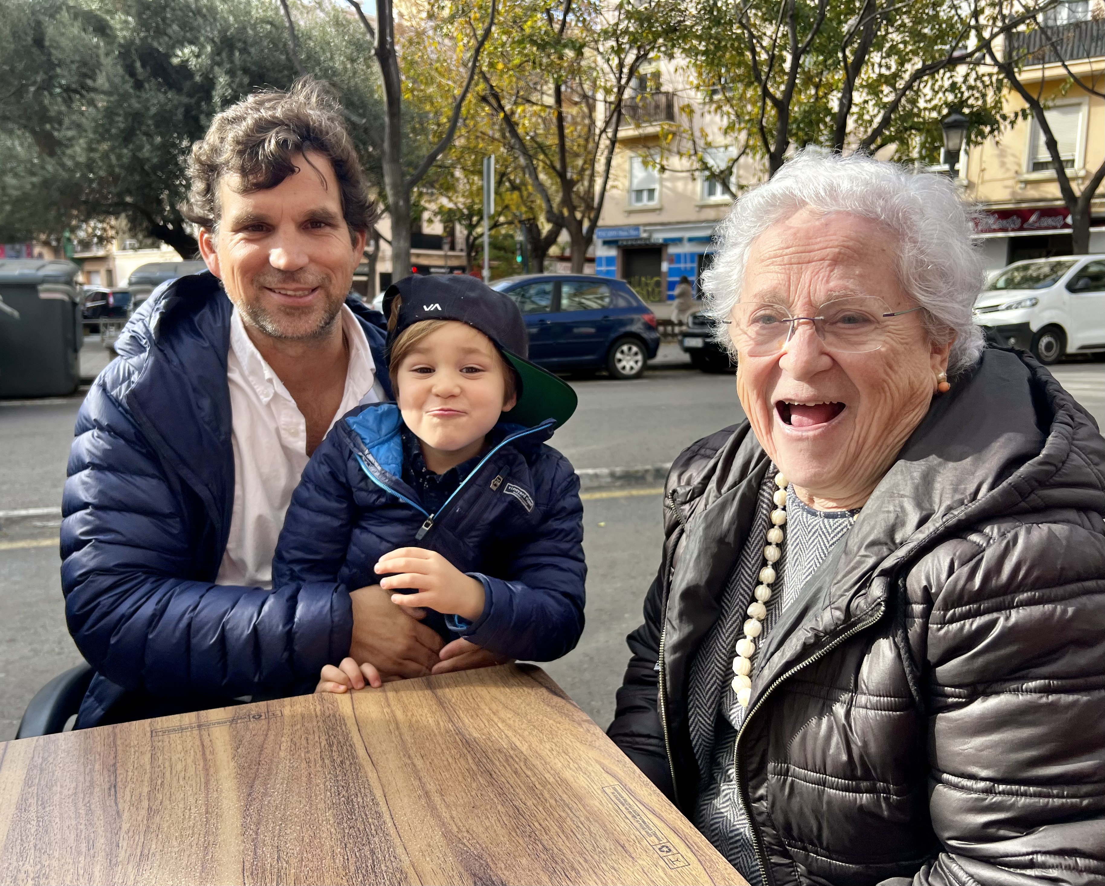 Img: coat, jacket, person, photography, portrait, city, street, neighborhood, wood, woman