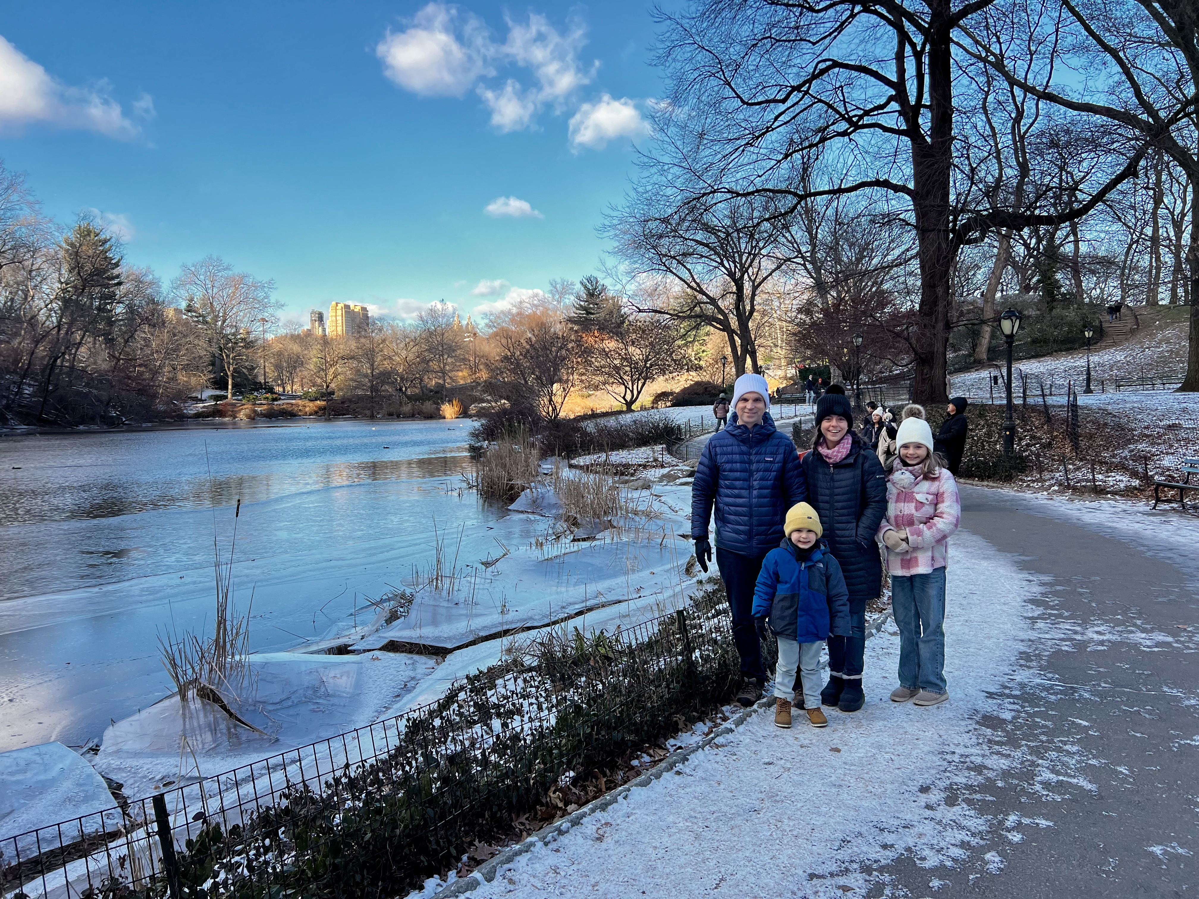 Img: pants, nature, outdoors, scenery, glove, tree, shoe, bench, person, hat