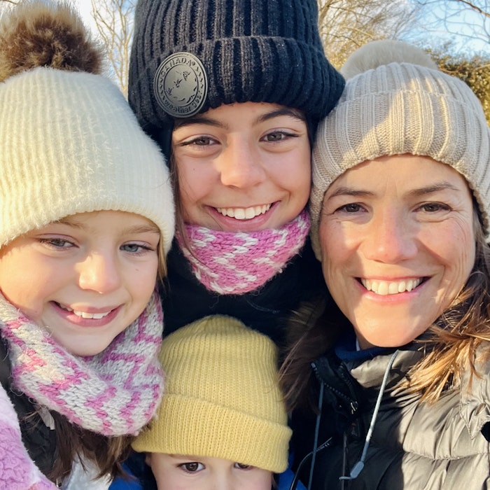 Img: cap, hat, face, person, portrait, beanie, coat, jacket, baby, smile