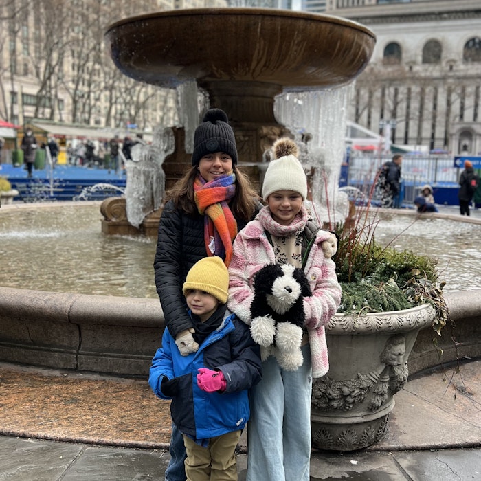 Img: pants, coat, fountain, water, photography, portrait, city, glove, jacket, urban