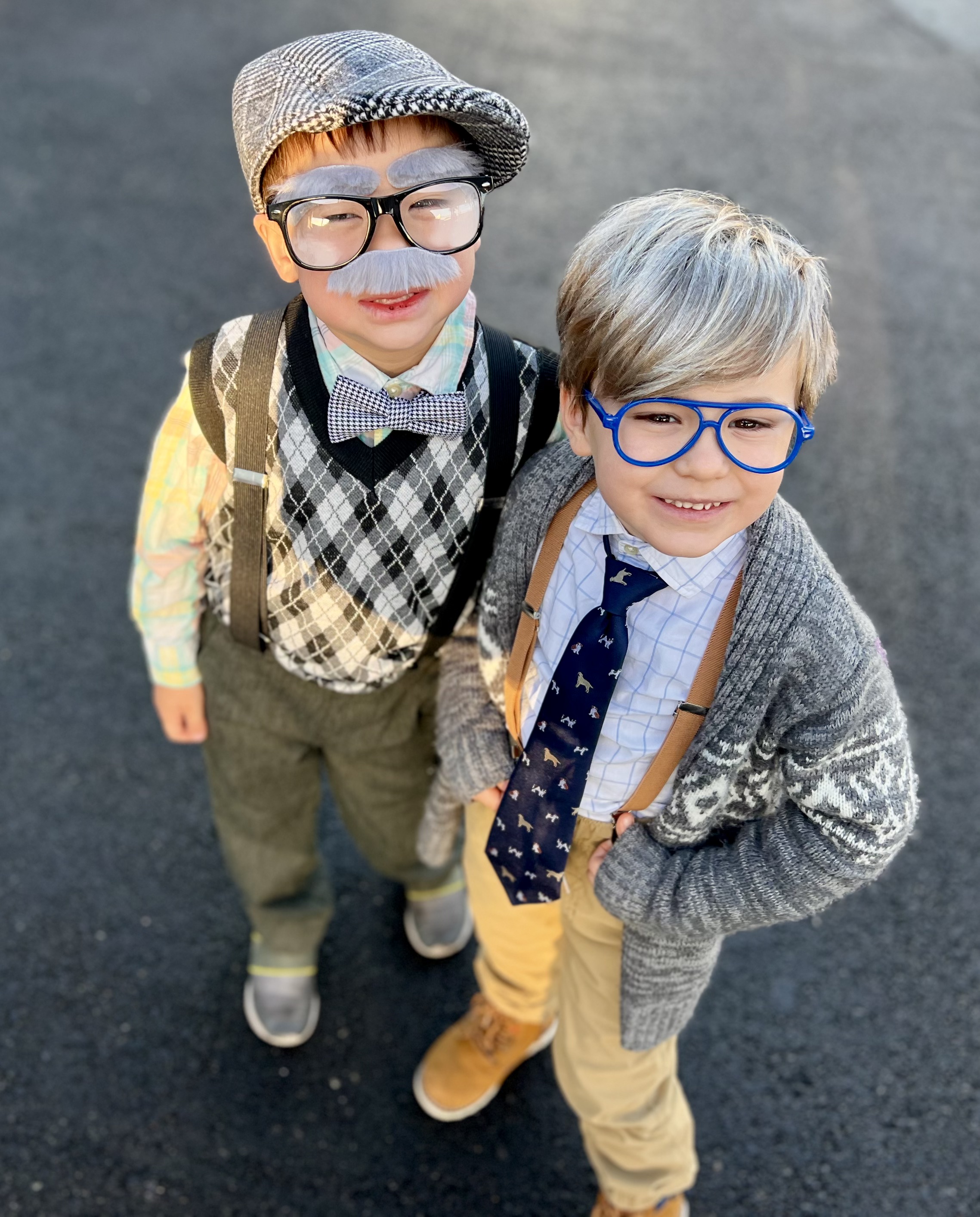 Img: glasses, photography, portrait, pants, coat, jacket, cap, smile, blazer, shoe