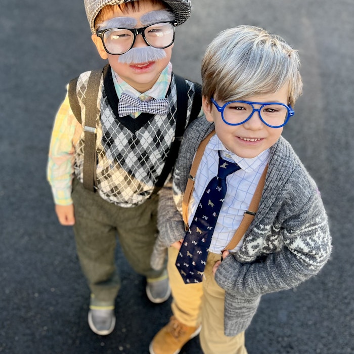 Img: glasses, photography, portrait, pants, coat, jacket, cap, smile, blazer, shoe