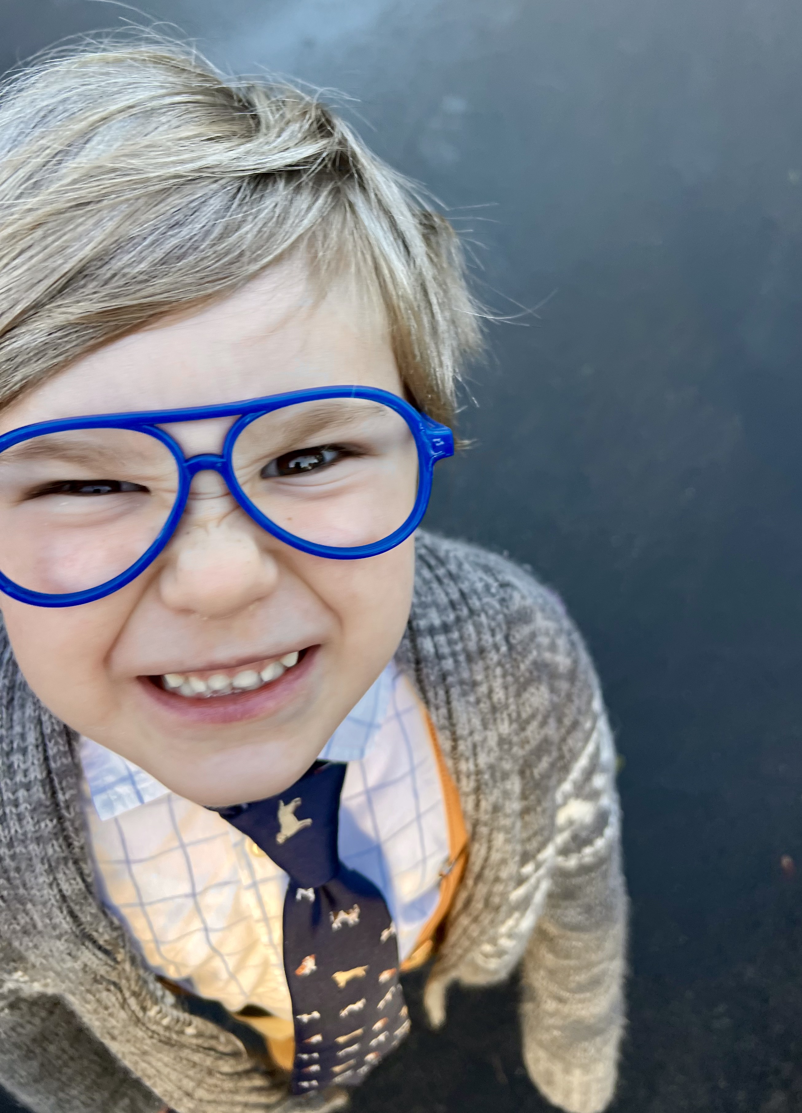 Img: accessories, glasses, face, head, person, photography, portrait, smile, formal wear, tie