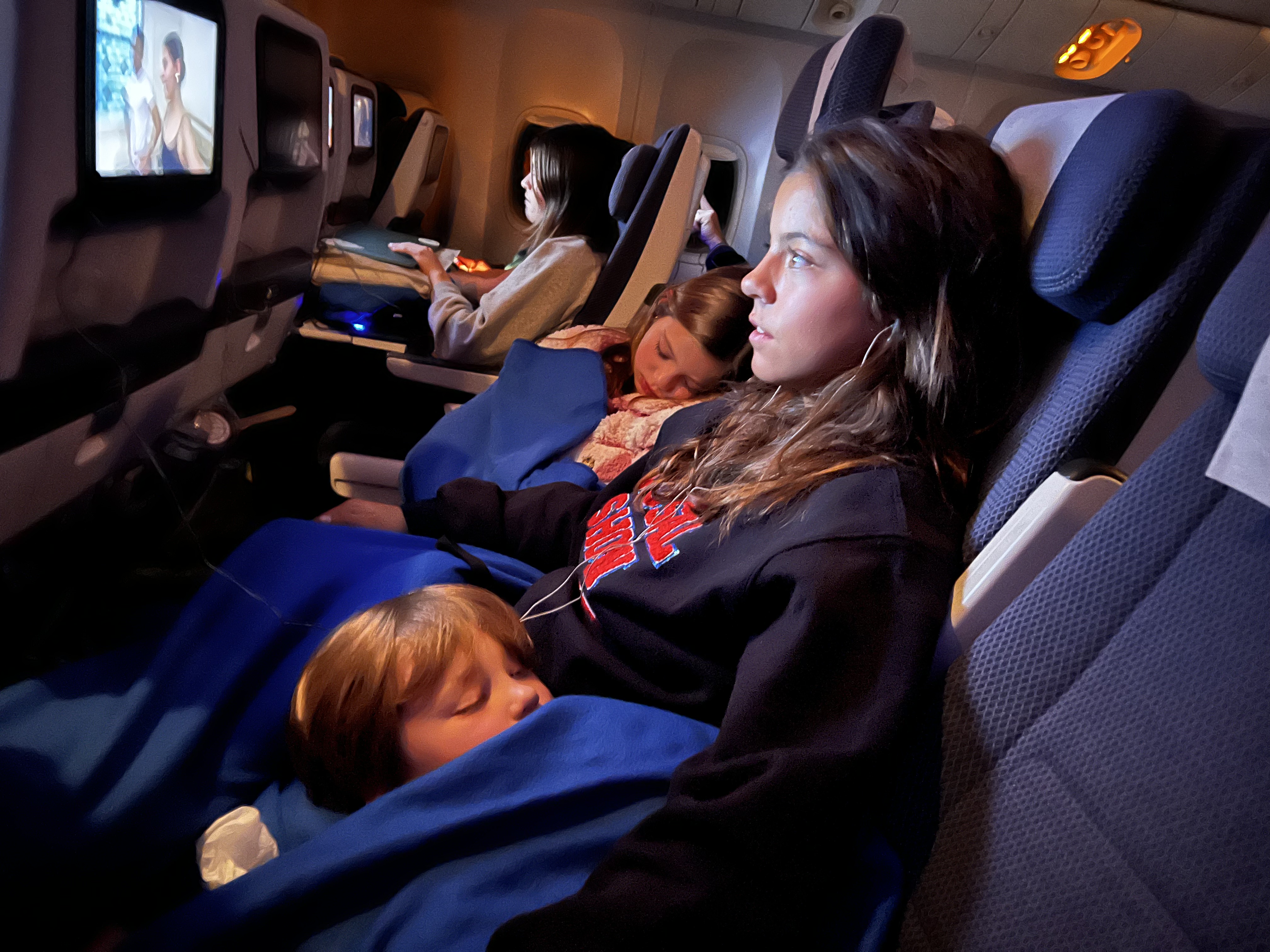 Img 1983: adult, female, person, woman, screen, computer hardware, monitor, cushion, tv, car