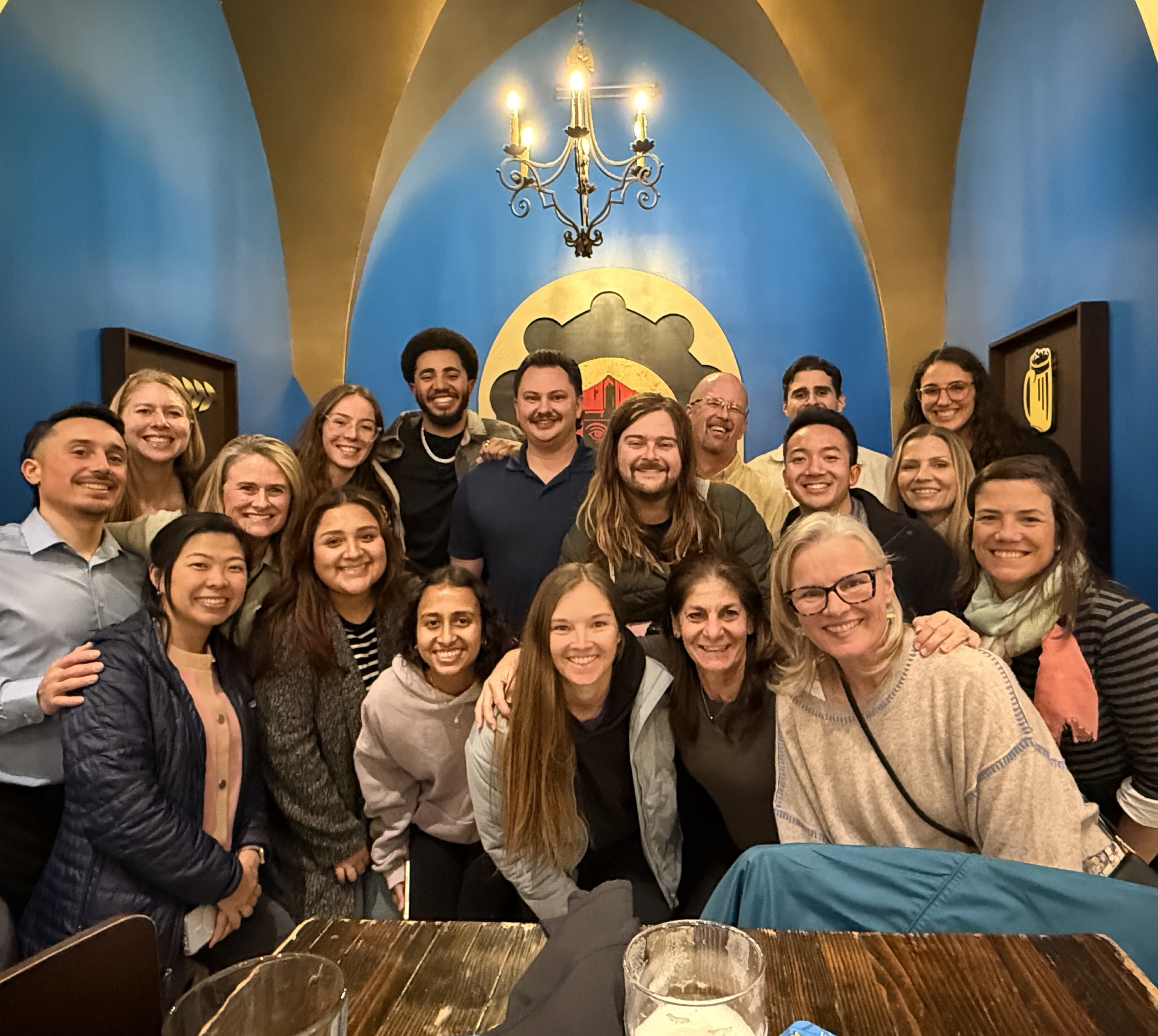 Img: lamp, adult, female, person, woman, people, cup, glasses, groupshot, smile