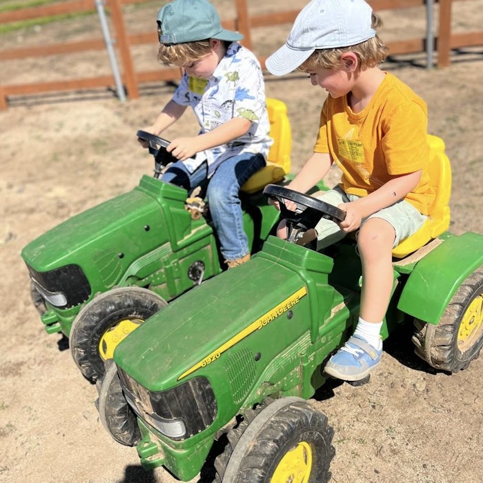 Img: grass, shoe, hat, boy, child, male, person, baseball cap, cap, tractor