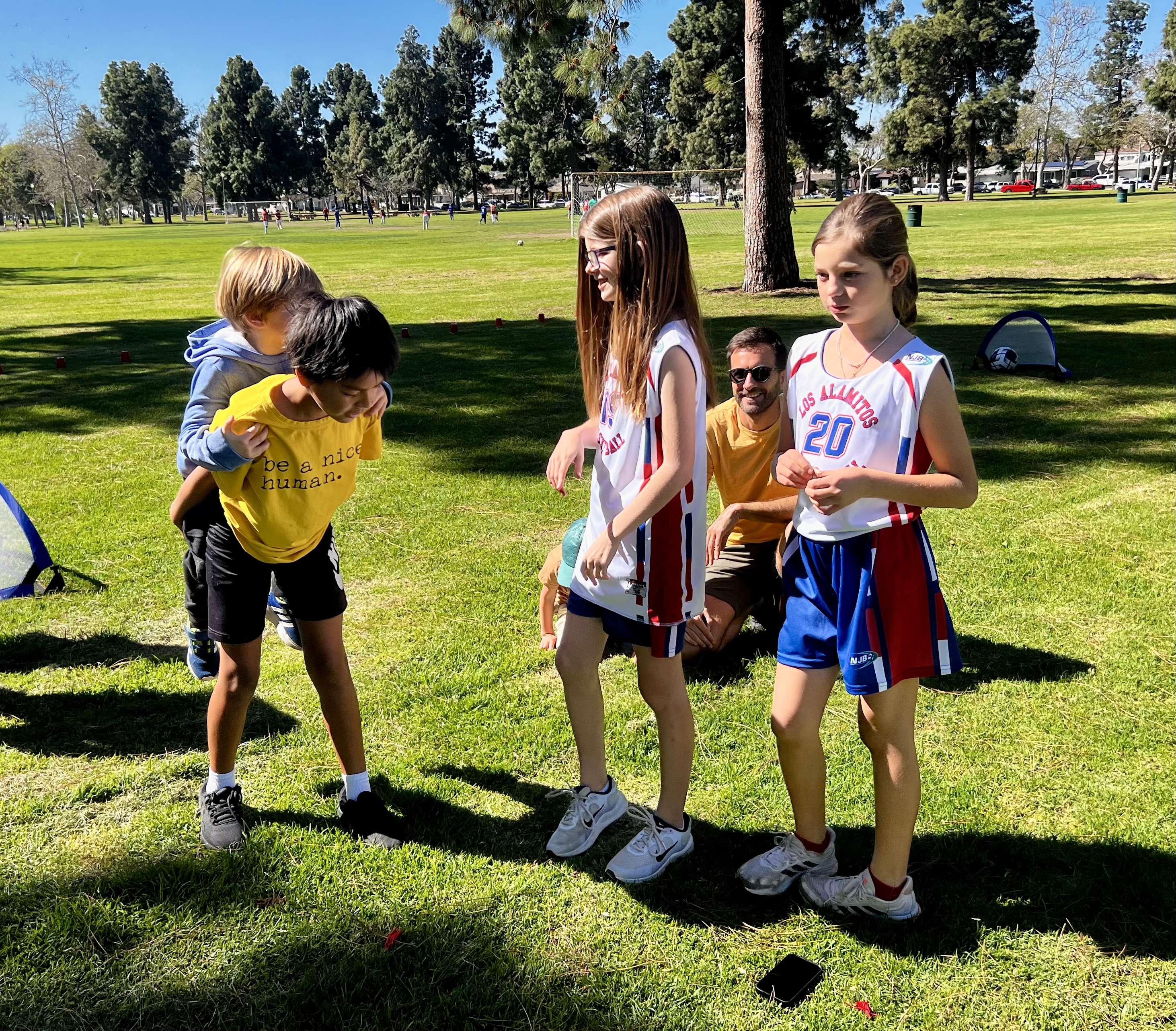 Img: grass, park, people, person, shoe, boy, child, male, adult, man