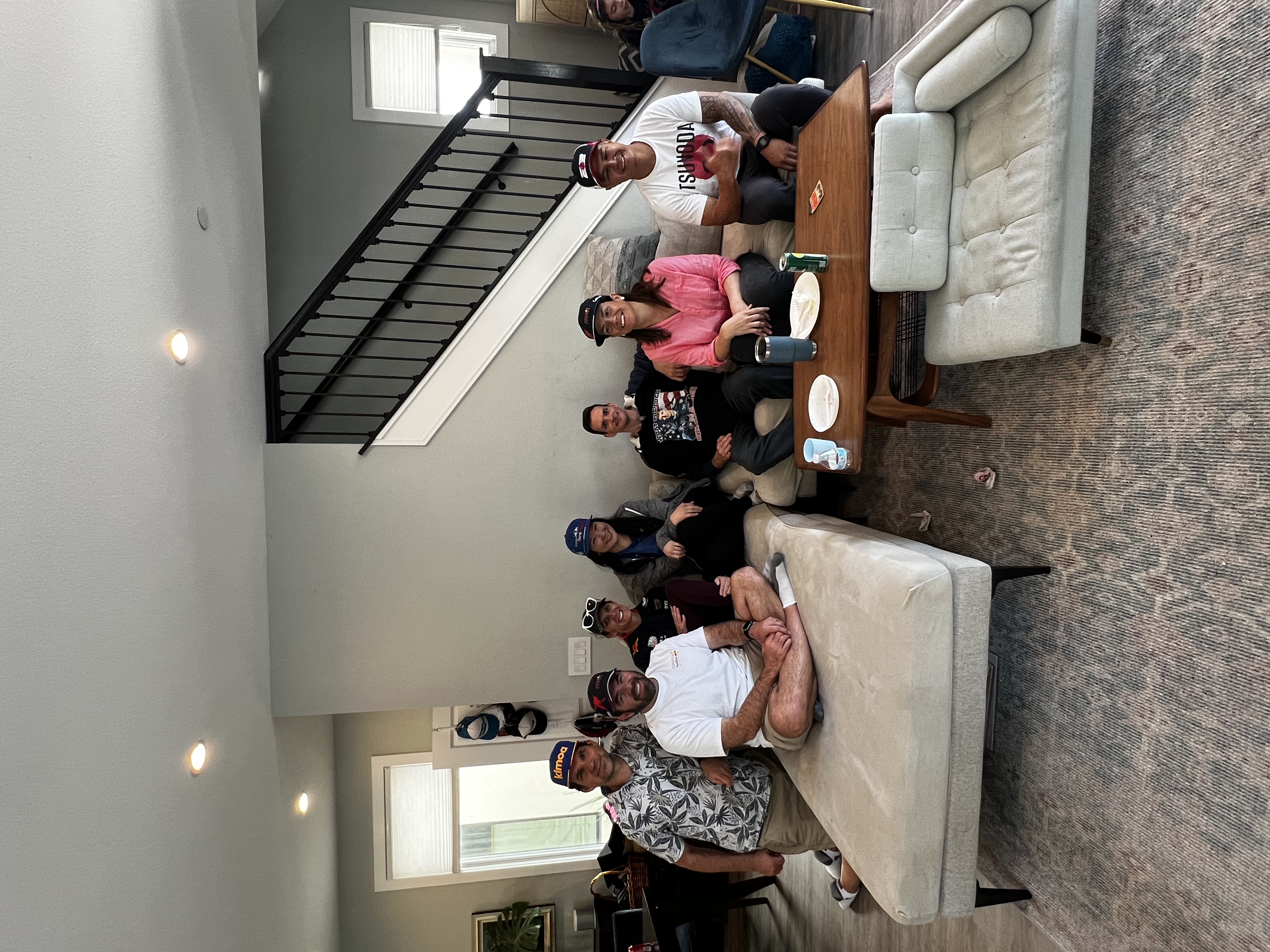 Img: couch, living room, people, person, coffee table, table, adult, male, man, woman