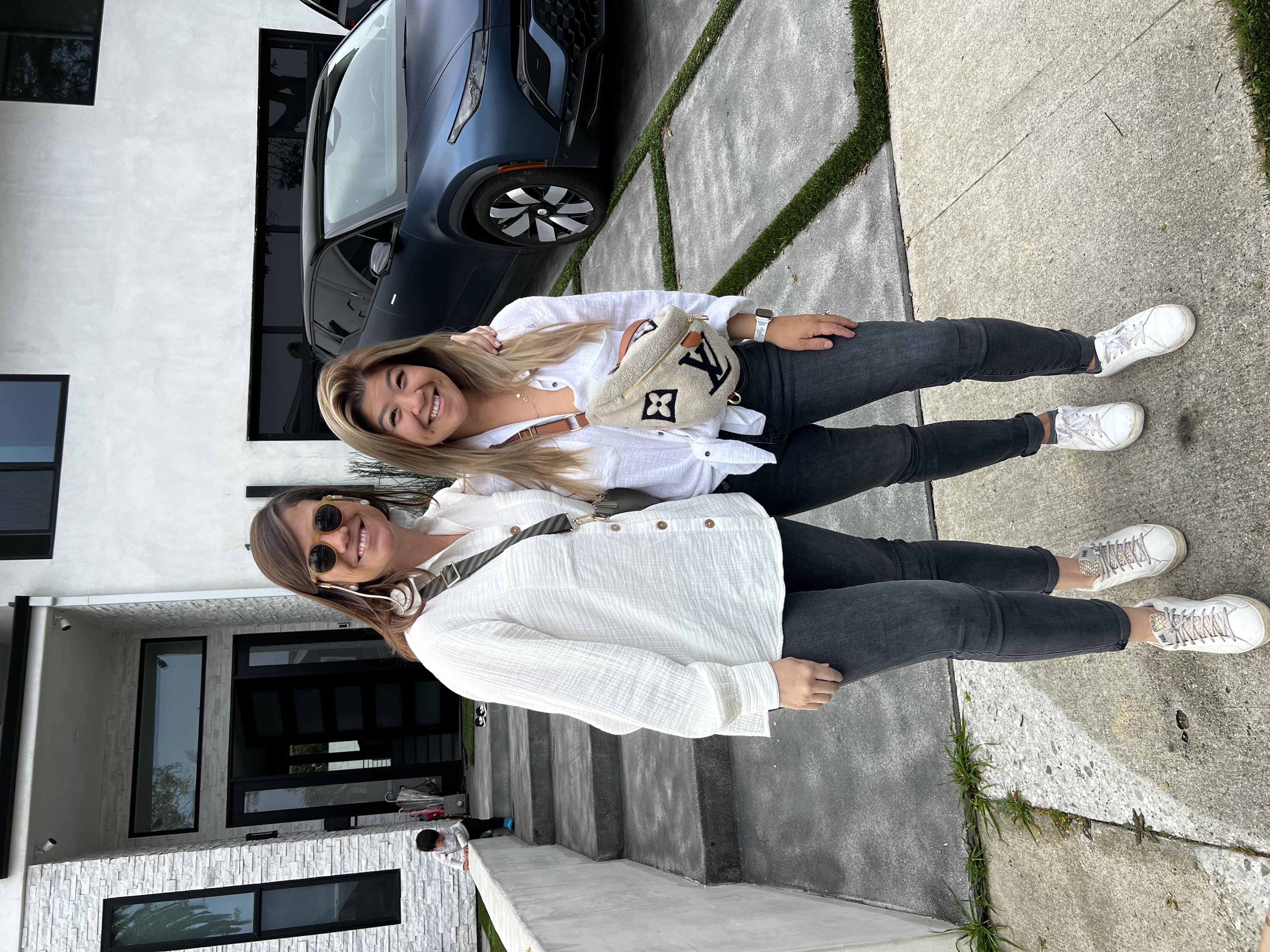 Img: pants, female, girl, person, teen, jeans, glasses, car, shoe, handbag