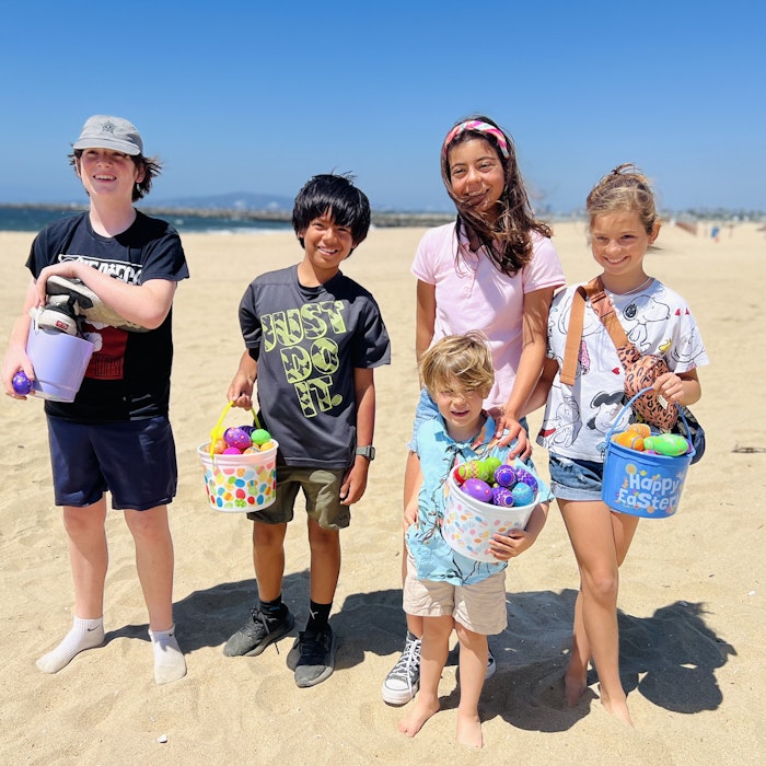 Img: beachwear, shoe, person, boy, child, male, hat, people, shorts, vacation