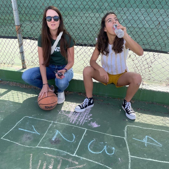Photo 2025: female, girl, person, teen, shoe, basketball (ball), portrait, glasses, pants, sitting