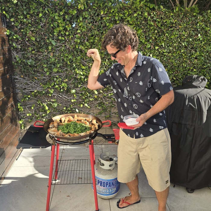 14f32f11 B0c9 4aea 9c71 76583373f1c0: bbq, cooking, grilling, adult, male, man, person, footwear, shoe, glasses