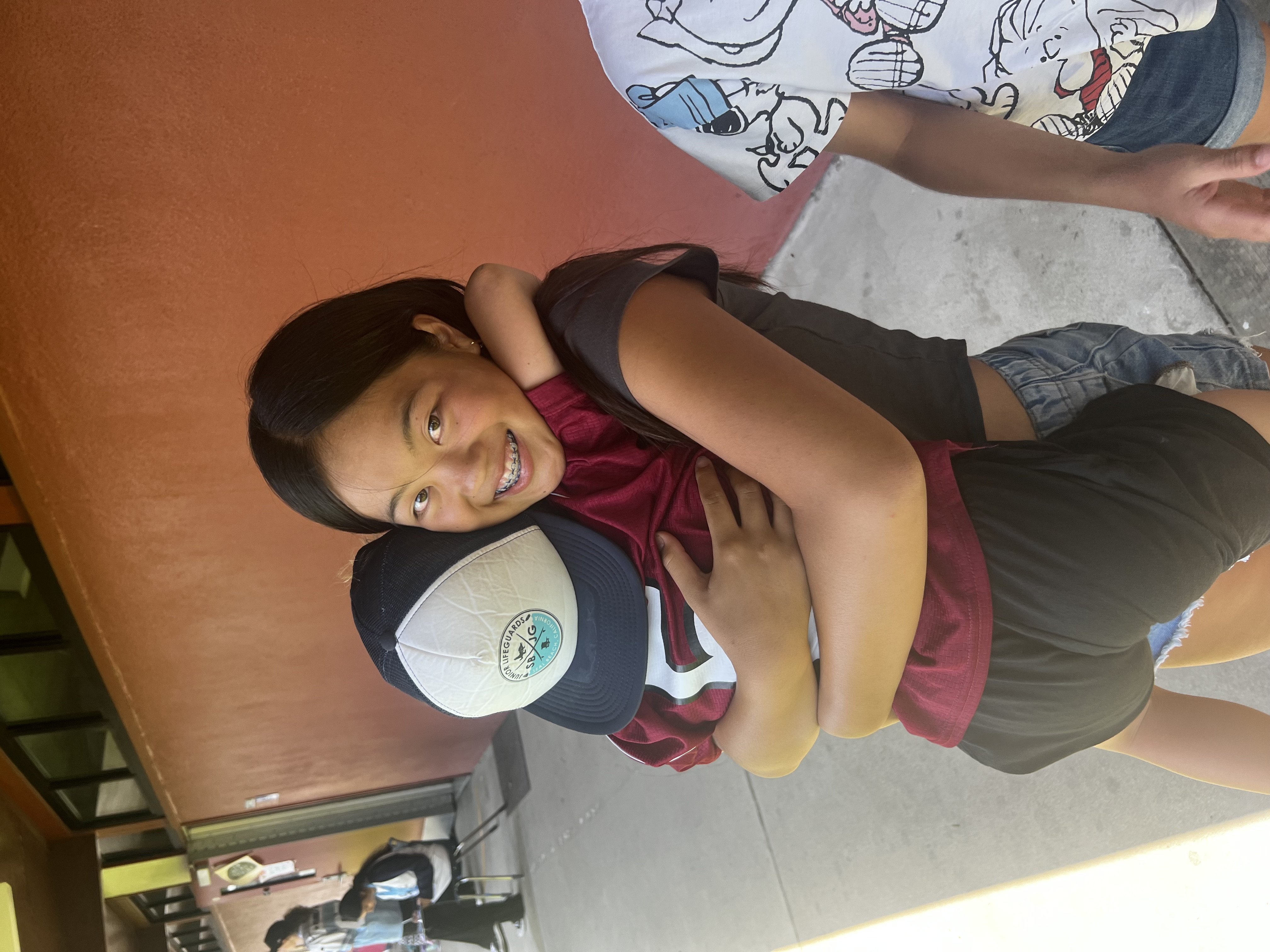 Img: person, photography, portrait, t-shirt, baseball cap, adult, female, woman, people, shorts