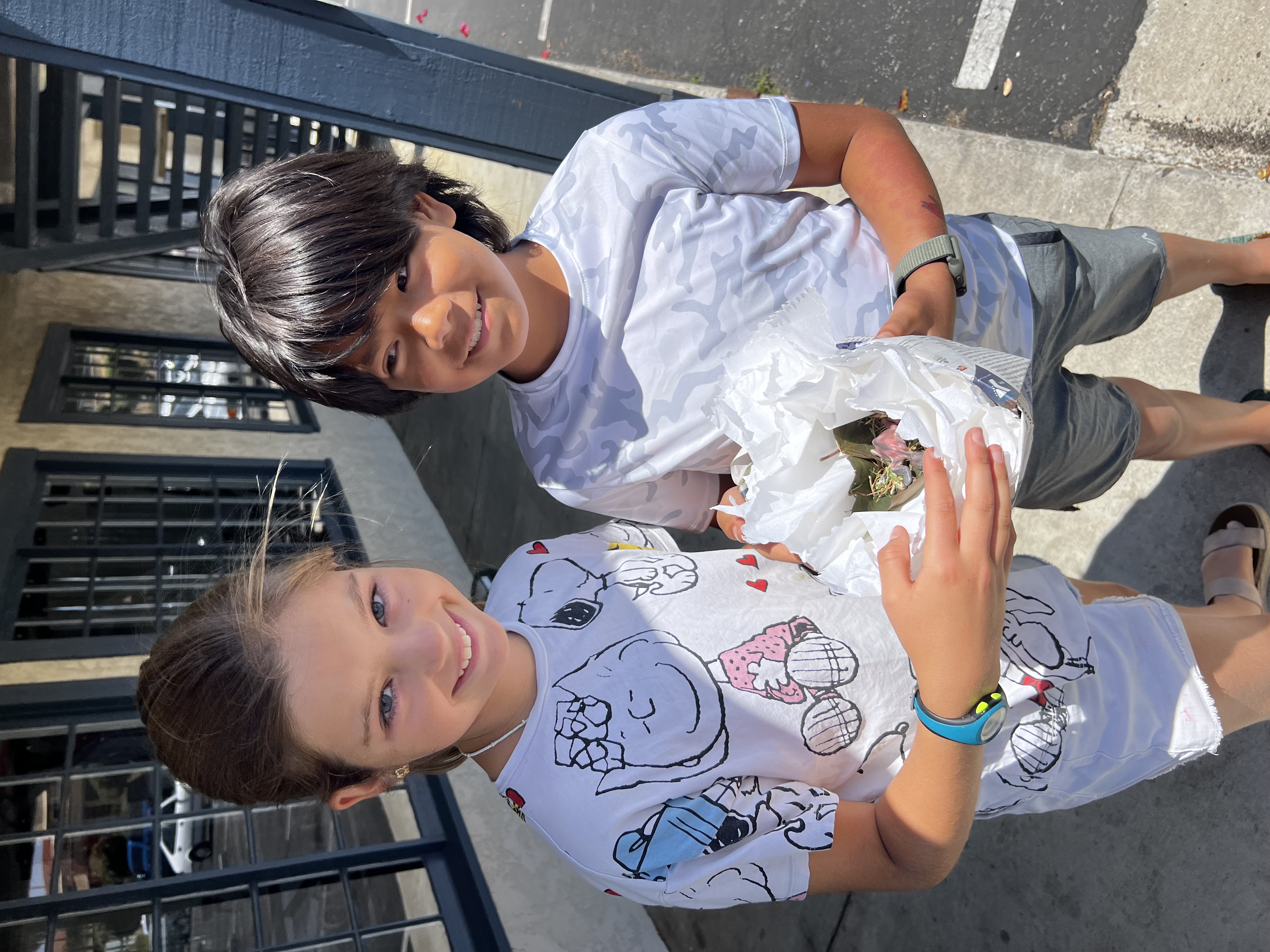 Img: t-shirt, city, street, shorts, child, female, girl, person, boy, male