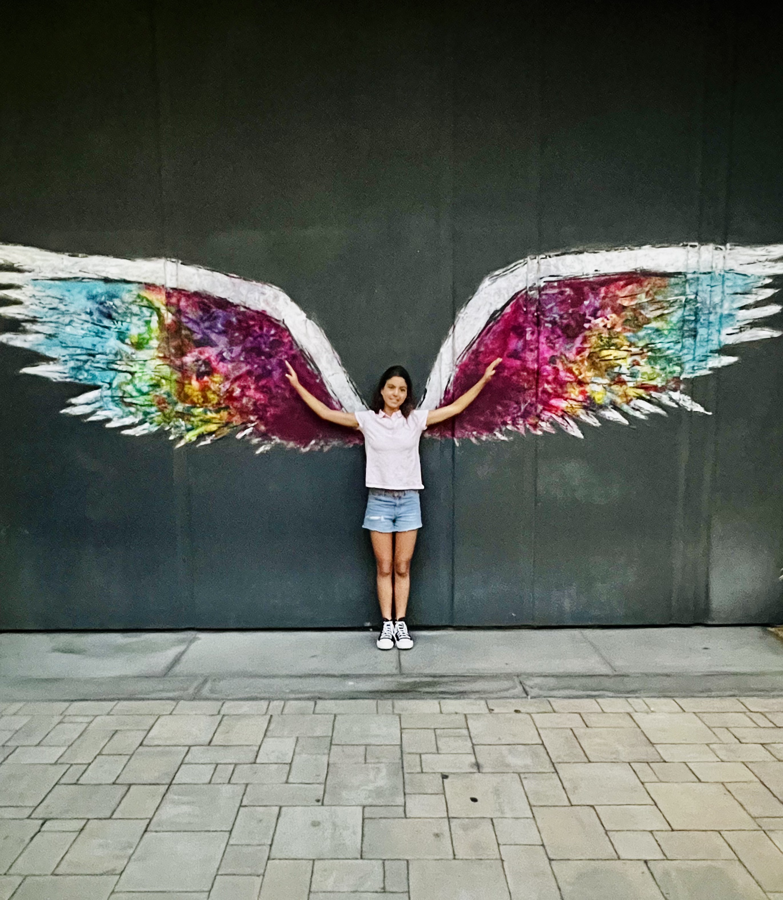 Img: female, girl, person, teen, clothing, shorts, footwear, shoe, sleeve, portrait