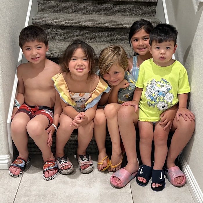 Img: people, person, shorts, shoe, sandal, child, female, girl, boy, male