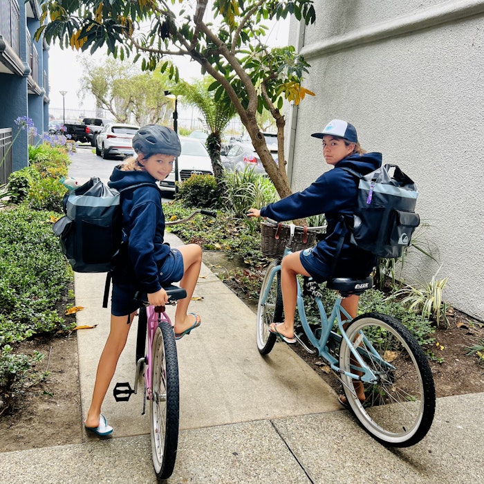 Img: helmet, backpack, hat, person, shoe, bicycle, car, city, cycling, pickup truck