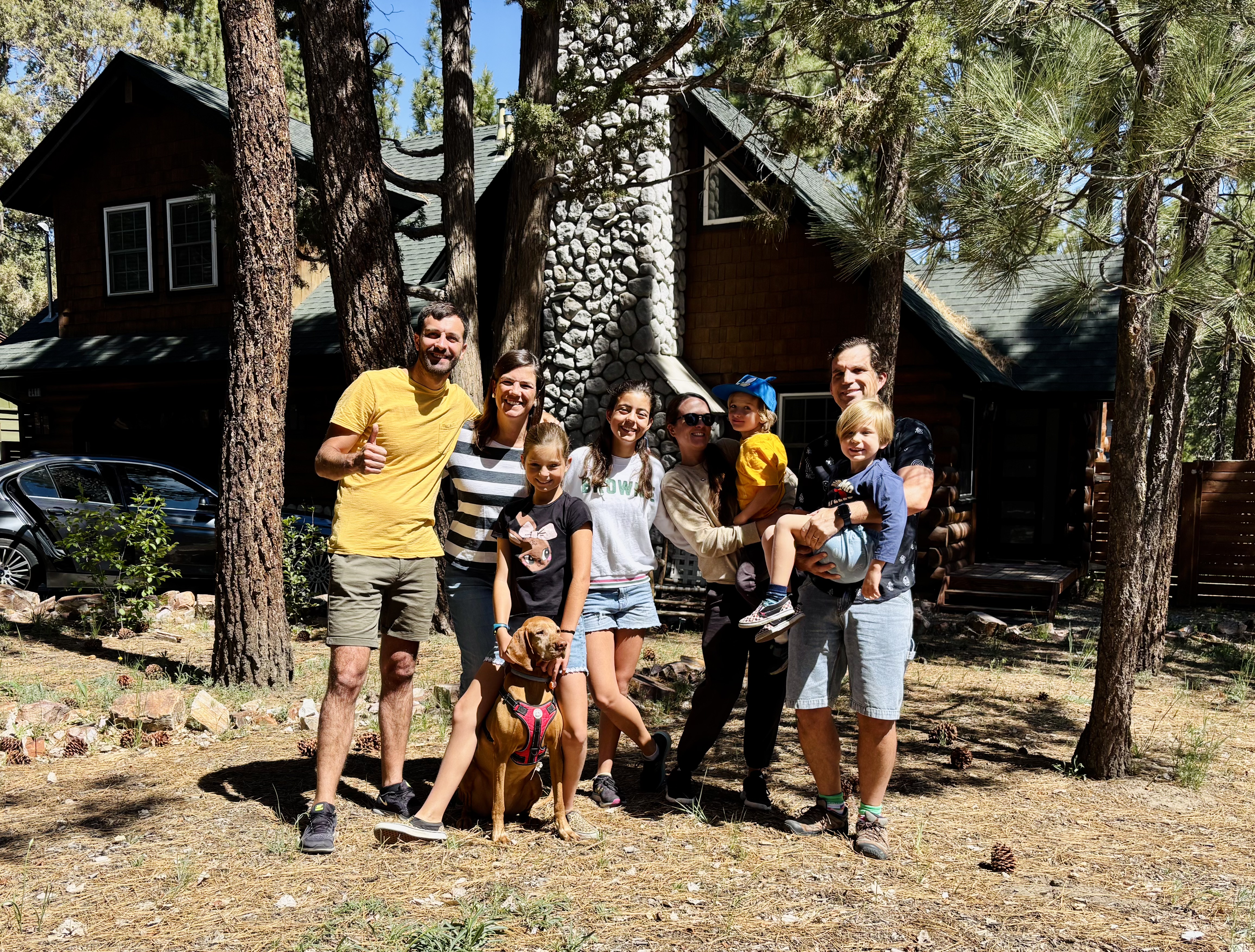 Img: people, person, shoe, shelter, adult, male, man, vegetation, car, dog