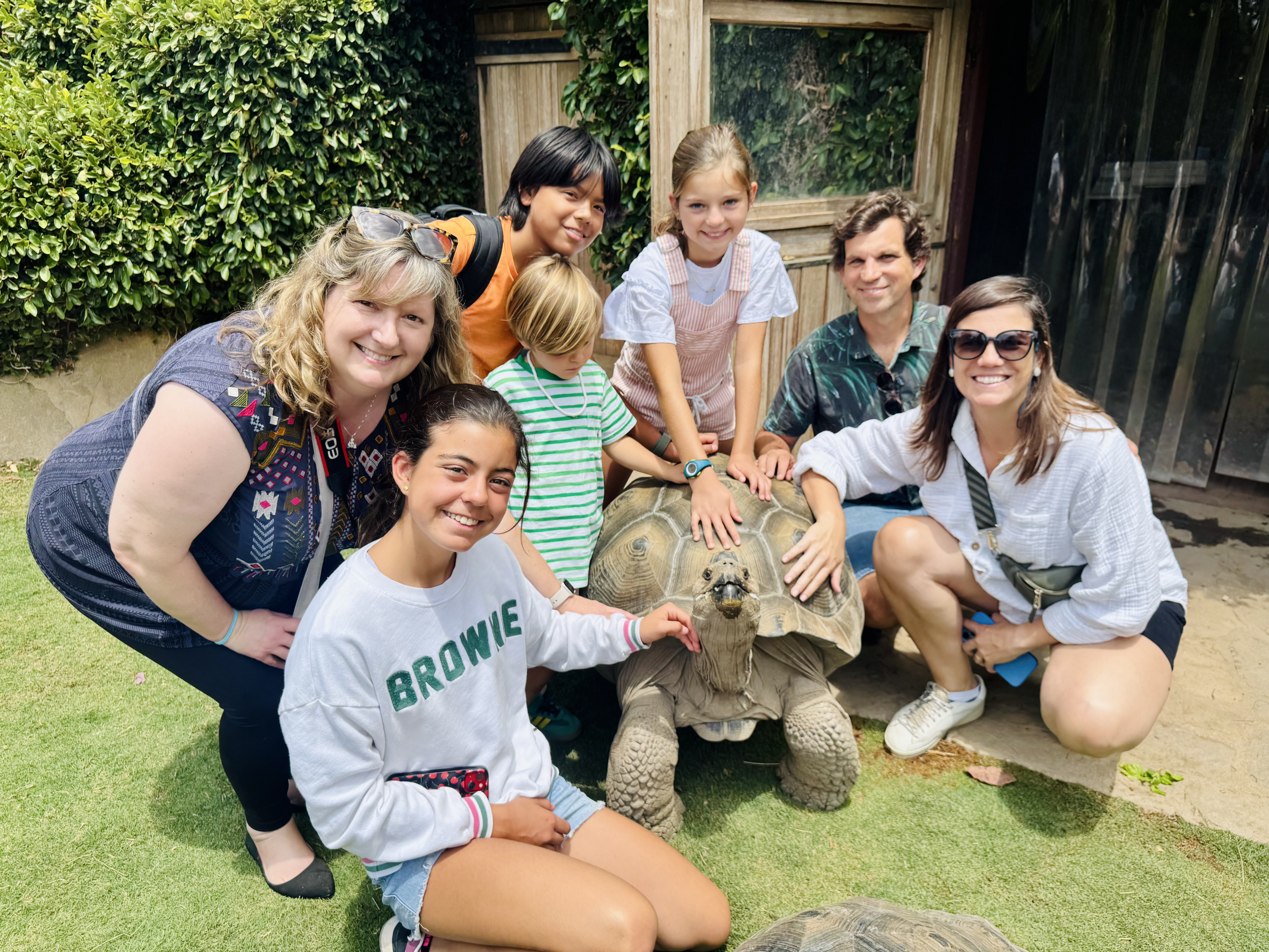 Img: people, person, shoe, grass, portrait, glasses, zoo, sunglasses, backyard, t-shirt
