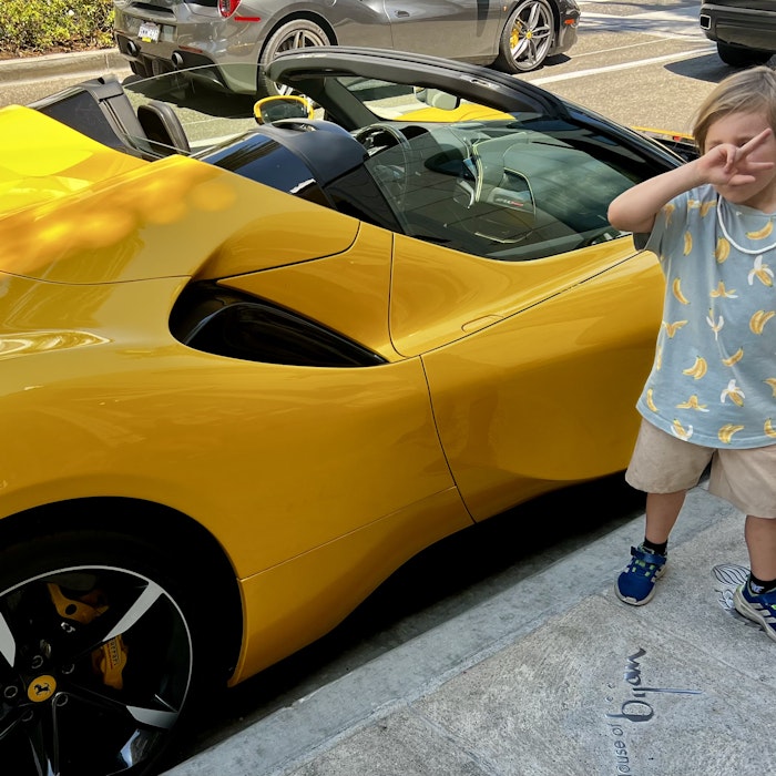Img: wheel, child, female, girl, person, shoe, alloy wheel, car, tire, sports car