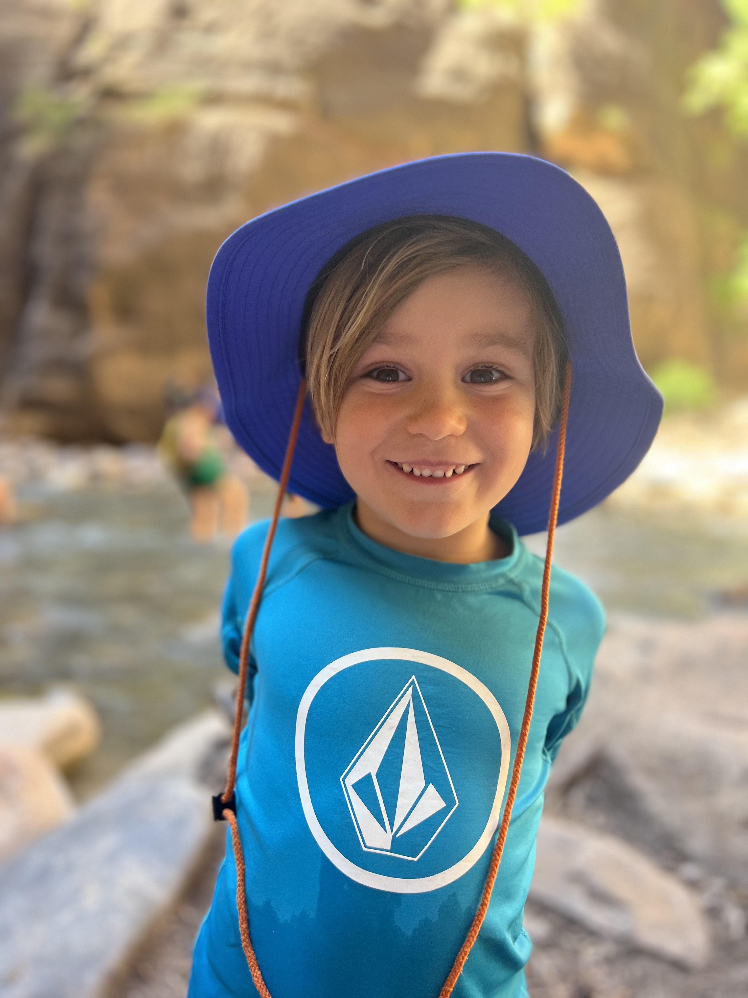 Img: hat, photography, face, head, person, portrait, rock, t-shirt, smile, cap