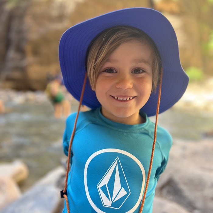 Img: hat, photography, face, head, person, portrait, rock, t-shirt, smile, cap
