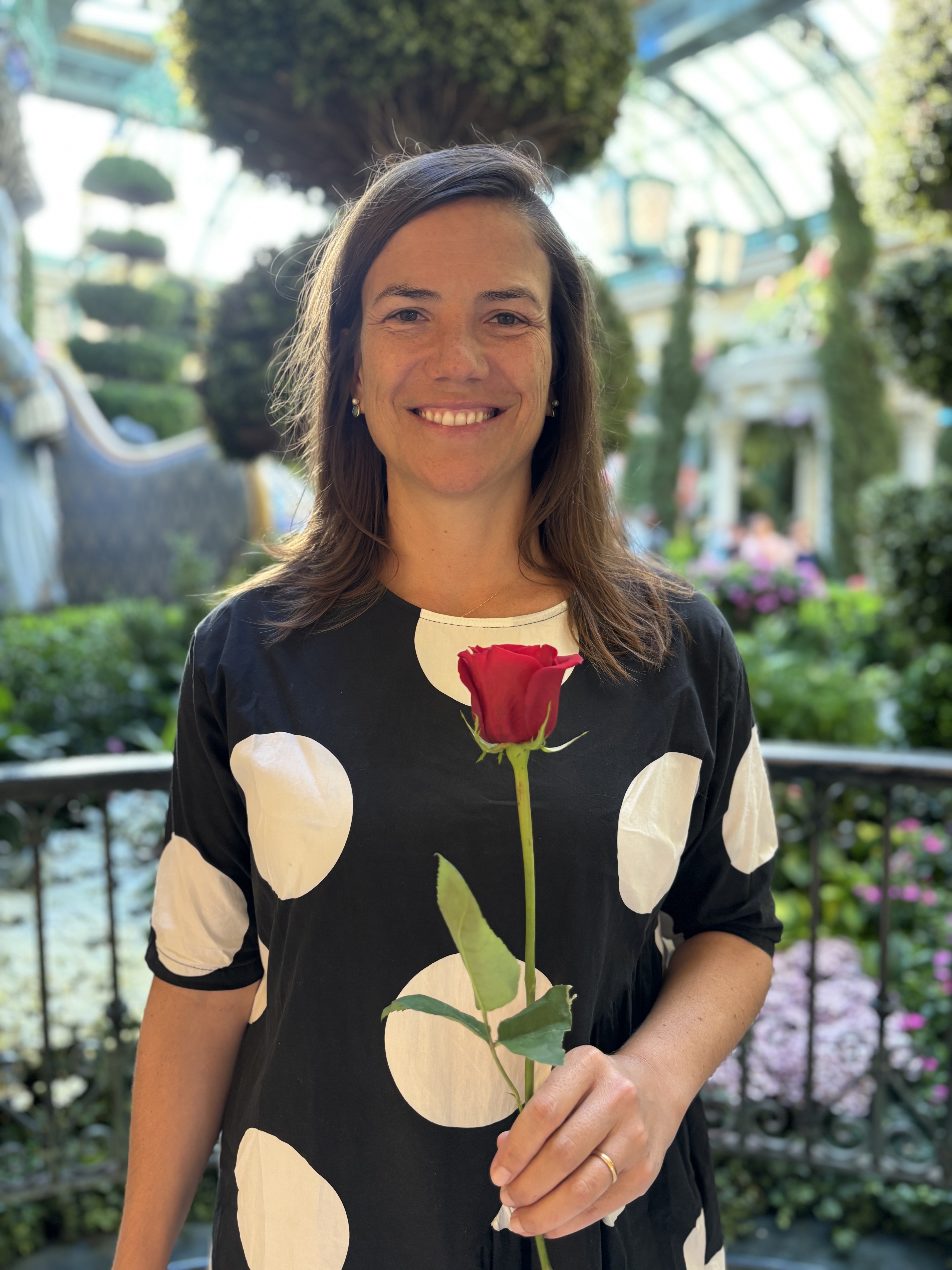 Img: rose, ring, face, head, person, adult, female, woman, blouse, portrait